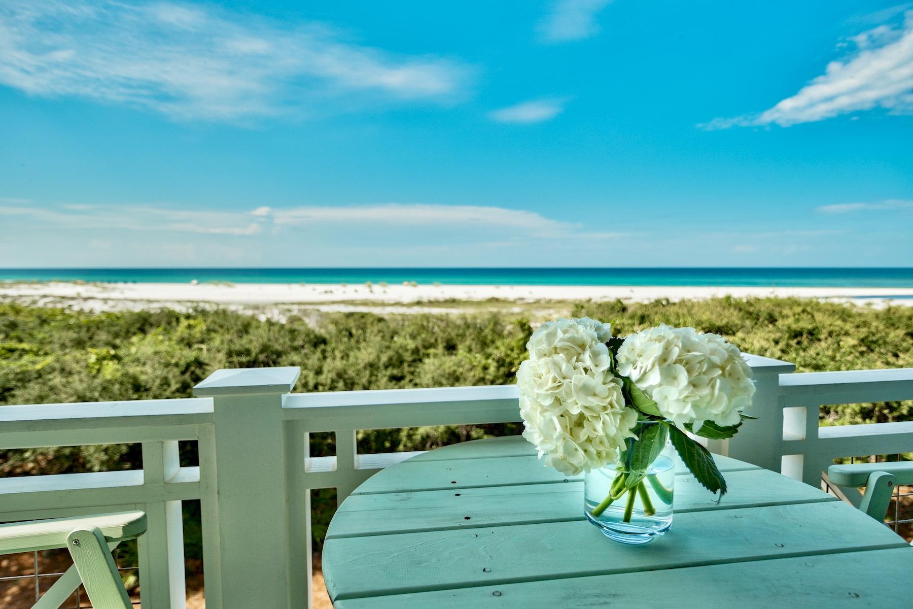 This stunning residence features the spaciousness of a beach house with the convenience of a condo and boasts a crystal clear view of the emerald green, sparkling Gulf of Mexico. Low, rolling sand dunes and the sugar white beach await via charming boardwalks and sandy pathways just steps from your door. When you pair the wonderful Watersound Beach amenities and location with generous space and quality craftsmanship, the only logical conclusion is to buy, to invest, to retire, to vacation and to enjoy the Florida lifestyle. This 3 bedroom, 3.5 bath, 2-level condo encompasses 2,126 square feet and boasts Viking appliances and marble countertops in the updated kitchen as well as a built in bunk to sleep two. Relax in the updated Master bathroom with marble shower, counterops and stunning soaking tub. This property's superior condition is a testament to the tender loving care it received, having never been used as a rental property, though it could be. The flexibility of open living space for entertaining and private guest rooms is complemented by covered porches overlooking sand dunes, beach and water on both levels. Natural daylight streams through floor-to-ceiling windows and doors for a bold, bright environment with the casual overtones of beach life. The Crossings at WaterSound Beach amenities include a swimming pool, fitness center, bike and walking paths, putting green and children's park.