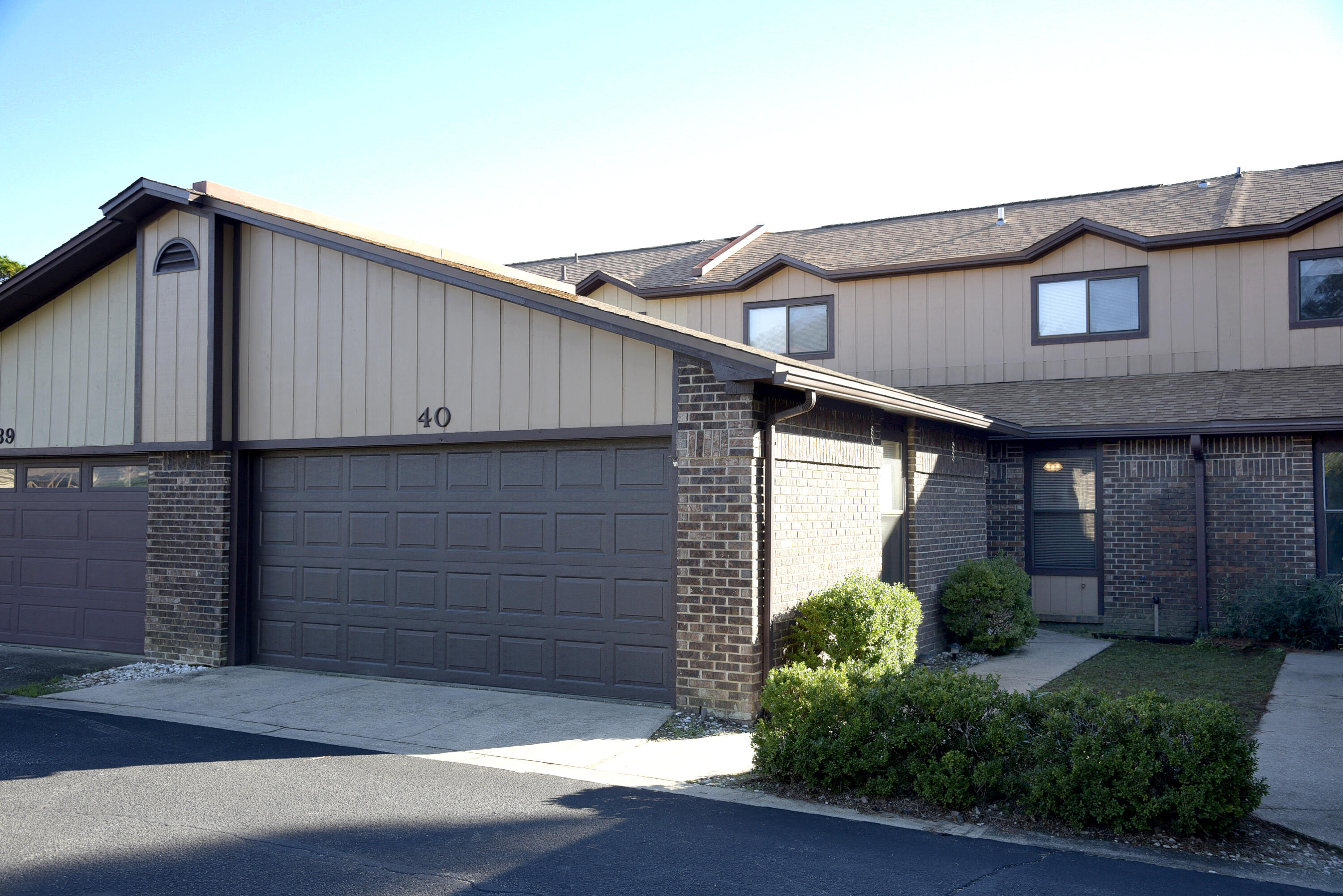 You'll love this spacious townhome in the serene community of Hidden Cove.The open floor plan features an efficiently designed kitchen with pass through to the dining area/great room featuring vaulted ceilings, a stone accent wood burning fireplace and luxury vinyl plank flooring. Two sets of sliding glass doors open to the long covered porch overlooking the pool area. A half bath, laundry room and master bedroom are also conveniently located on the first floor.  The master bedroom has luxury vinyl plank flooring and an en suite bath. Upstairs you'll find a loft overlooking the great room as well as two additional bedrooms and a full bath.   An extra bonus is the full two car garage with pull down stairs to access the attic. Enjoy all the amenities of Hidden Cove - a pool, tennis courts, community dock, boat slips available for rent on a first come first served basis and gorgeous views of the bayou.  HVAC 2014 and HWH 2015. Call today for your appointment to view this special property!