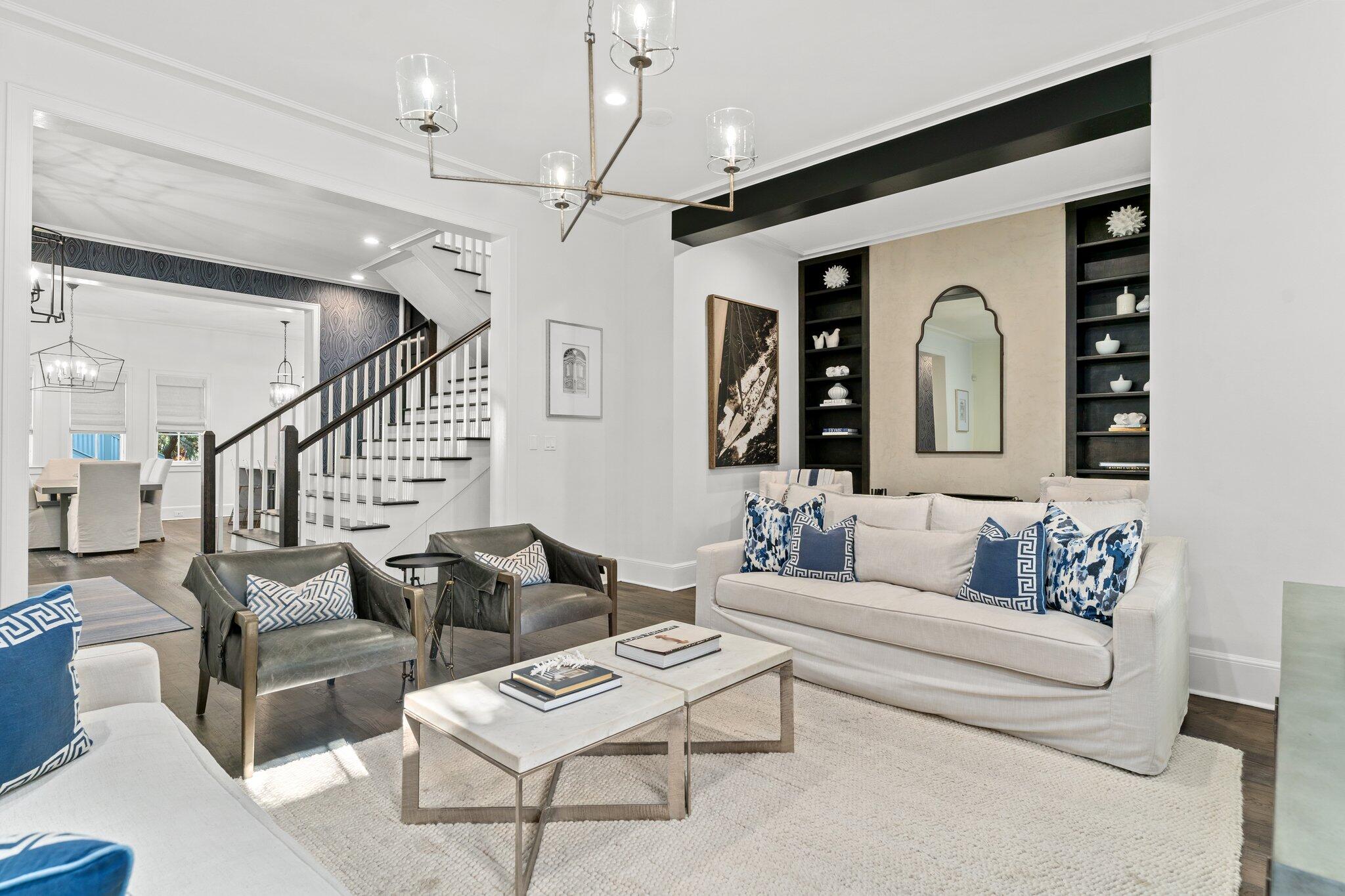Producing over $292,000 in actual rental income last year, 101 Round Road is a premier investment property on the south side of  Rosemary. This stunning, fully-renovated property is offered fully furnished with strong rental history & future bookings in place. 101 Round has generated over $253,000 in rental income YTD. This property is currently offered at the lowest price per foot available for any home on the south side. The 3,685 SF residence exemplifies refined, coastal luxury in the heart of Rosemary. Just a 5 minute walk away from Paradis, Pescado, Edwards & La Crema, you can truly enjoy all the best Rosemary has to offer. Originally designed by famous Rosemary architect, Bobby McAlpine, this stately home offers a main house, carriage house, two car garage & courtyard. The kitchen has been marvelously designed with a stunning waterfall island, gas range & pendant lights. The living room is excellent with its moody built-in bookcases & a warming fireplace. The primary suite is located on the second floor. The primary suite has a large walk-in closet & a luxurious primary bathroom. From the primary you can access a wonderful covered porch, perfect for relaxing after a long beach day. Two other bedrooms with en-suite bathrooms are also located on the 2nd floor. The third level has an additional living room, serving as a great place to play games & watch movies. This 3rd level has two sets of bedrooms, both with built-in bunk beds ideal for rental income. The carriage house is separate and easily reached through the courtyard. Thoughtfully-designed it has a full kitchen with stainless steel appliances. The carriage house offers a queen bed, two twin beds & a full bathroom, perfect for a weekend getaway. Bring your favorite realtor & tour this amazing home today! Rental history, rental projections & estimated expenses are available by request. Inquire today to receive more details.