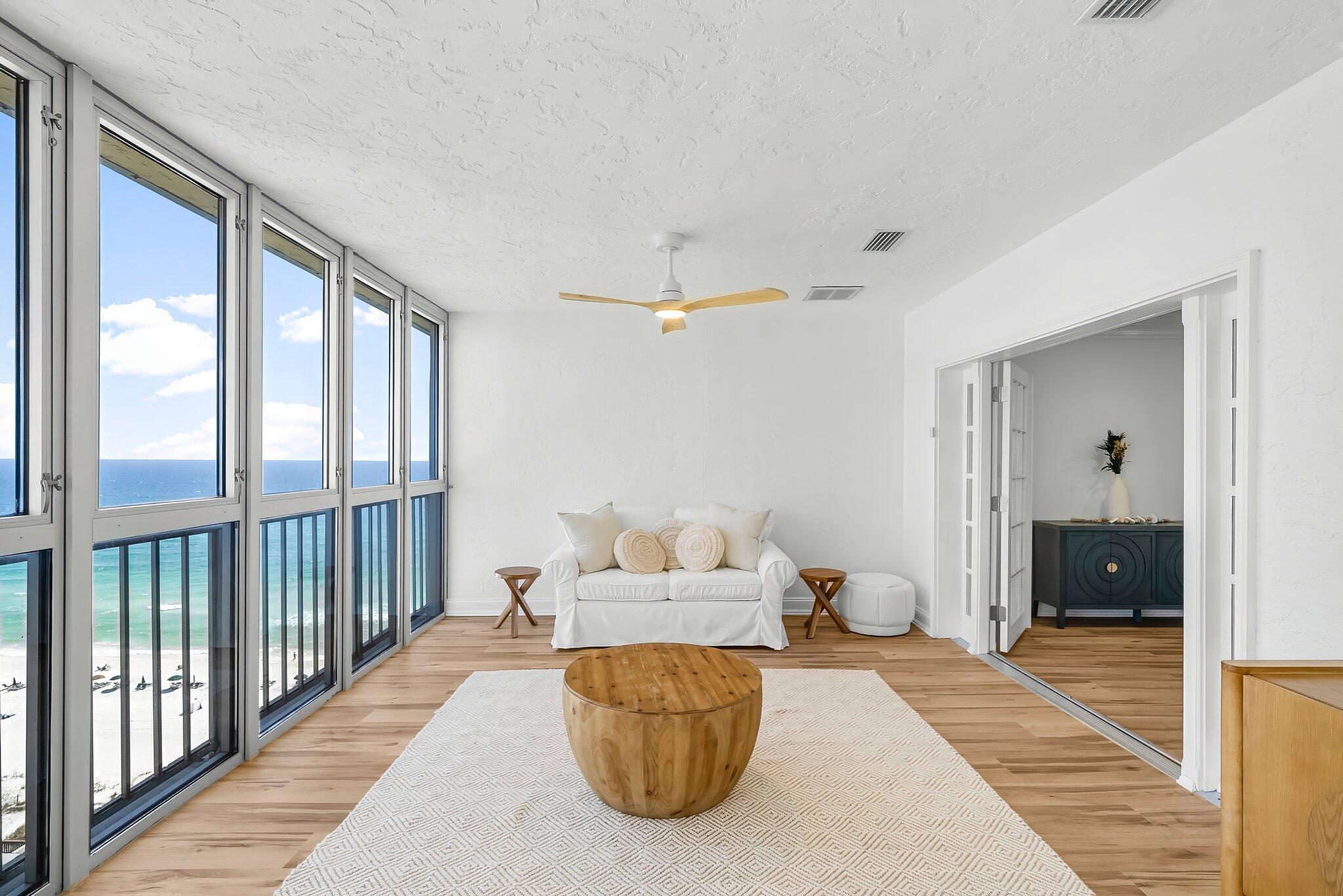 **Stunning Gulf View Penthouse - The Crown Jewel of Regency Towers**

This exquisite Penthouse is the largest in Regency Towers and is a true crown jewel, spanning over 3,200 sq ft and offering breathtaking views of not only the emerald waters and white quartz sand beaches of the Gulf, but also the Bay, Lagoon, and surrounding area. Completely renovated and never rented, this true Paradise is move-in ready with all brand new finishes and furnishings.

*For short term rental investors* projected to earn $120,000 in rental income as it sits, ask your realtor to share rental projections. This penthouse is spacious enough to add a 4th bedroom or bunk room to maximize rental potential or leave as is and enjoy the open floor plan*

Entertain guests in style with two temperature-controlled Florida rooms, complete with fully operational wall-to-ceiling windows that provide expansive views of the Gulf, Bay, and Lagoon. The main balcony turned Florida room boasts range hood ventilation, and is the only residence in the building with the unique ability to GRILL - with a view! 

This penthouse features two master bedrooms with Gulf views, three king bedrooms in total, all adorned with brand new furnishings and decor. The kitchen is equipped with new, never used, stainless steel appliances and range hood.  Plenty of seating for friends and family around the kitchen island and spacious adjoining dining room.  The recessed dome ceiling and sputnik chandelier add depth and elegance. 

Life proof LVP flooring throughout, fresh paint, all new light fixtures and fans add a modern touch, while spacious closets throughout and custom built-in shelving in the walk-in master provide ample storage.

You will love the artistic tile in the renovated bathrooms, stylish vanities and even a touch light mirror for added luxury.

Embrace resort-style living with exceptional amenities, including 600 feet of beachfront, two Olympic-sized beachfront pools (one heated year-round), a full-service bar & grill, a 10-person hot tub, kiddie pool, fitness center, billiards room, and a community room with a kitchen for hosting events. Enjoy numerous picnic areas with grills and engaging in-house activities year-round, along with convenient beach chair and umbrella rentals.

The location is unbeatable, with nearby attractions such as golf courses, fishing excursions, dolphin tours, parasailing, helicopter tours, Top Golf, Dolly Parton's Dinner Theatre, St. Andrews State Park, take a day trip to 30A, and much more. Explore local restaurants, boutiques, and entertainment options, including Pier Park and coming soon-Tootsie's Beachfront bar and music venue, and, a Surf Club!

What if everyday was a day at the beach? This one of a kind penthouse is not just a home; it's a lifestyle waiting for you. Schedule your private tour today!