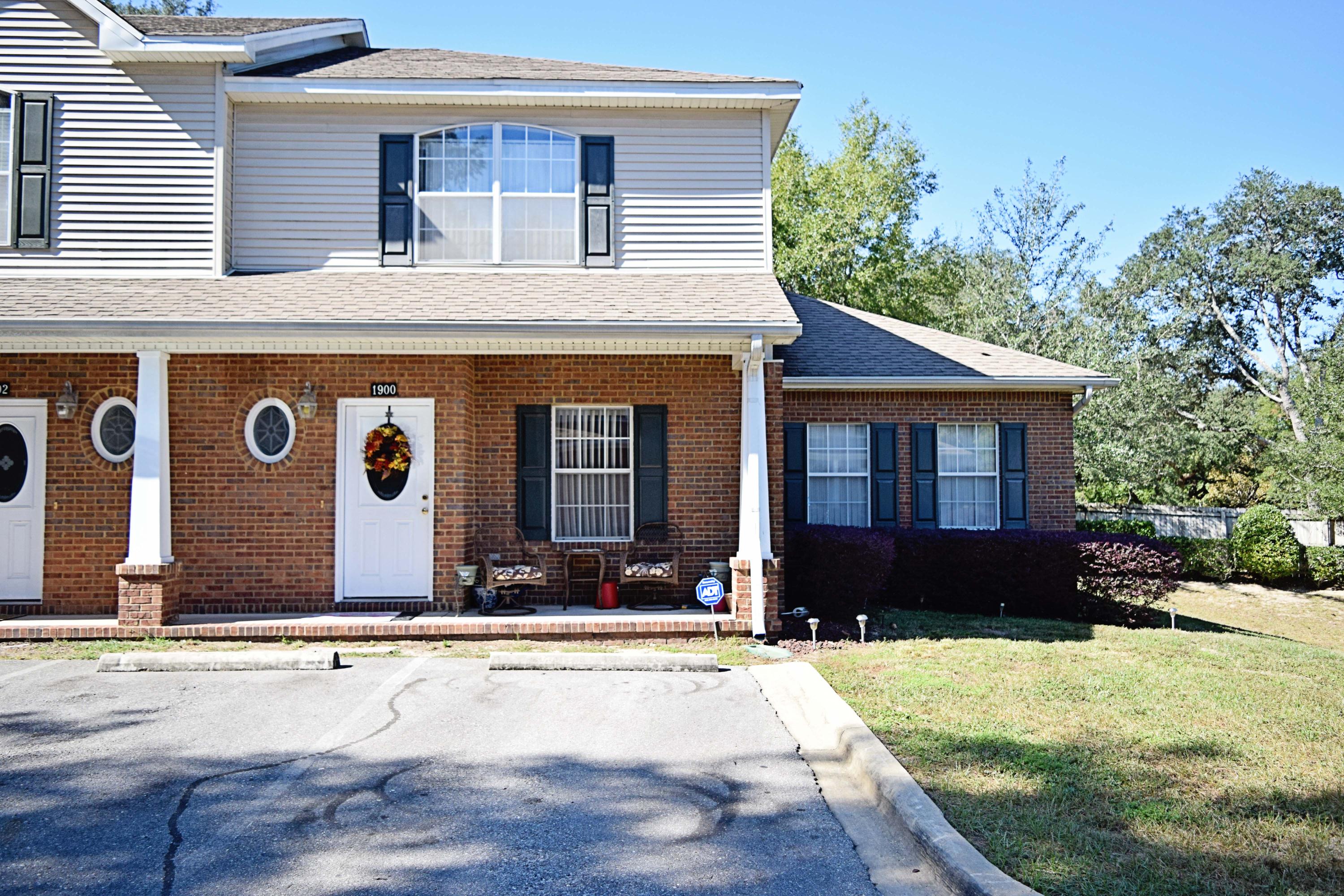 This beautiful 3 bedroom, 2 and a half bath end unit town home is large enough for your family! Downstairs master and two bedrooms plus full bath upstairs. Kitchen has lots of storage and and stainless steel appliances and granite counter tops! Washer and dryer in the unit if you need one. Living area downstairs has neutral tile flooring. Bedrooms have brand new carpet!! Downstairs master has a large walk in closet, double vanity, and walk in shower. End unit so there's a small grass area for kids to play as you watch them from the sitting area of the front porch. Owner will consider a pet that is spayed or neutered and fully housebroken and at least a year old. Association takes care of yard maintenance and owner pays for interior pest control. Available now, for $1450/month