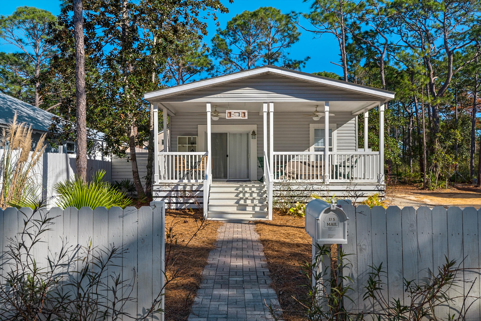 This home, located in Gulf Shore Manor, is on a quiet road off 30A in the heart of Seagrove, with no through traffic, no HOAs, and deeded beach access. It is sold furnished and beautifully decorated, featuring 9' ceilings and a privacy fence. It makes for a perfect primary residence or vacation rental investment! This beach house is situated in the heart of Seagrove, about a mile from Seaside. Half a mile to the Gulf and backs up to state forest trails. There are endless amenities, restaurants, shops, and entertainment easily accessible by foot, bike, or golf cart. Watercolor Publix is around the corner, and Grayton Beach is just down the road.