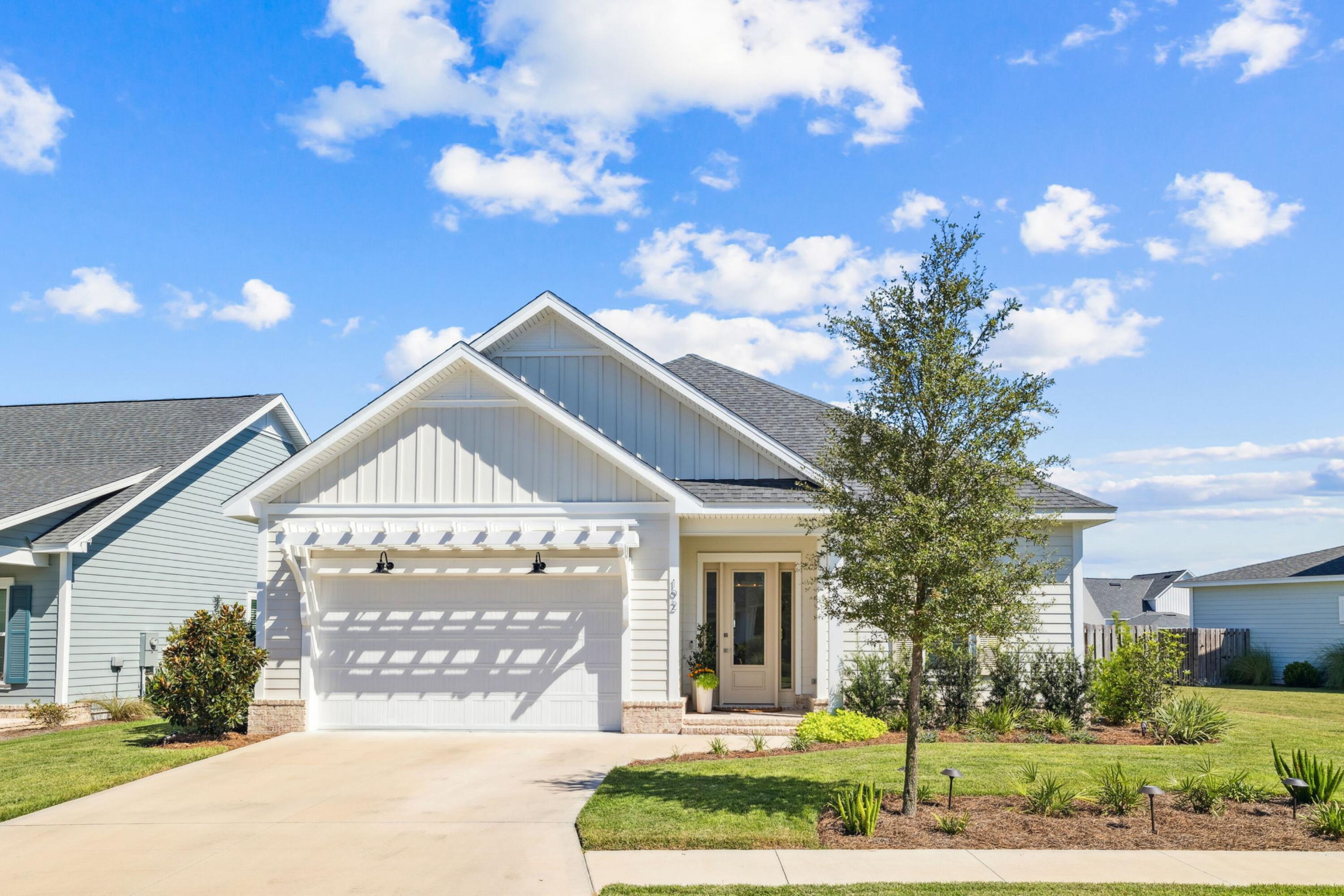 Tucked away on a rare corner buffer lot with captivating curb appeal in Longleaf Park this impeccably maintained and highly sought after single-story floor plan is ready to welcome you home to coastal living, just minutes away from 30A! With many thoughtful and functional upgrades, this like-new home boasts the uncompromising quality of Huff Homes with ten-foot ceilings throughout, luxury vinyl plank flooring (no carpet), four inviting bedrooms full of natural light, two pristine bathrooms along with a half-bath. The primary bedroom is perfectly positioned near the rear of the floor plan for ultimate privacy and connects to the en-suite, spa-like primary bathroom which features a double vanity, sleek frameless glass shower and a soaking tub. The heart of this home is in the inviting, open-concept living space, where the kitchen, dining and living room create a natural flow and an intuitive layout for everyday living. The kitchen features an extended quartz island with front-facing cabinets under the bar for additional storage, complemented by high-end appliances including the 30-inch gas range with vented hood, soft-close drawers and cabinetry, under cabinet lighting and modern finishes. 

Step outside to your large, screened-in patio with an heirloom brick floor overlooking a serene pond view creating an ideal retreat for both relaxing and entertaining.

Additional highlights include upgraded, melamine wrapped wood closets throughout (no wire shelving), an automated irrigation system for effortless upkeep, a well-equipped Laundry Room with GE Profile Top-Load Washer and Dryer along with a set of upper cabinets for additional storage. You'll also discover a pair of YOLO Stand-Up Inflatable Paddle Boards and Beach Cruiser Bikes in the spacious two-car garage, which are yours to enjoy with the purchase of this home.

Watersound Origins is one of South Walton's most-coveted coastal communities, known for its outdoor lifestyle, abundant amenities and prime location. Longleaf Park is conveniently located near the front of Watersound Origins making for easy access to Watersound Town Center, the open-air, walkable lifestyle center that continues to bring a new level of excitement and convenience with a growing collection of shops, restaurants and more. Additionally, the Village Commons, the recreational focal point of Watersound Origins, offers exceptional community amenities including a resort-style pool, fitness center, tennis, pickleball, golf, nature trails and access to the Lake Powell dock all surrounded by natural beauty and just minutes away from 30A!