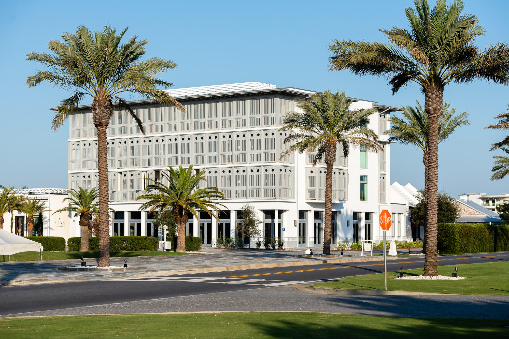 The May, located on a prominent corner of Town Center and home to The Citizen, a Coastal Tavern, is home to this light-filled beautiful condominium. The corner unit boasts floor to ceiling windows in the living room and bedrooms, offering unique views of the rooftops of Alys and the open Amphitheatre. Folding doors across the width of the residence open fully onto the generous 13'8'' x 7' front balcony, perfect for alfresco dining or enjoying a sunset cocktail. The master and guest bedrooms open to a shared balcony offering eastern views. Soothing colors and materials are used throughout the residence, including Blizzard Caesarstone counters in the kitchen and Carrara Marble counters in the baths, and light gray cabinets throughout. Iconic Venetian Plaster on the walls and ceilings of the main living areas allows light to dance across the home, lending to its elegant feel.  The residence comes furnished with minor exceptions, so is move-in ready for the new owner to start enjoying the cooler fall weather right away.