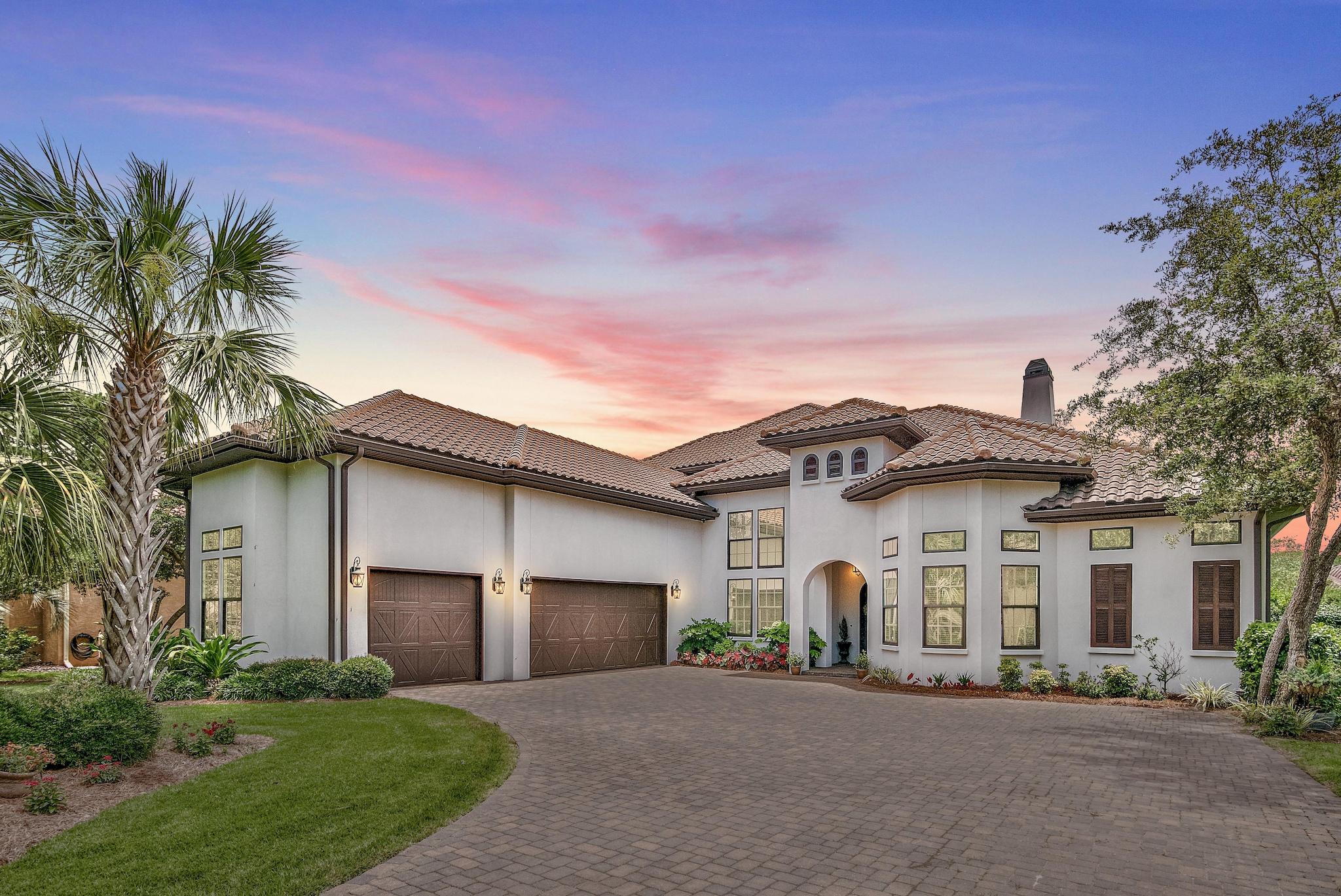 This beautiful home was custom built as the primary residence of a well established local builder. A builders personal home is always custom fit with the finest materials and plenty of upgrades.
This spectacular floor plan includes; a car lift in the garage, large outdoor living space, covered pool, jacuzzi, summer kitchen and spectacular view.
Don't miss this opportunity to own a unique lakefront treasure in the heart of Regatta Bay. Featuring 3 bedrooms plus office on main level and 2 bedrooms plus workout room and bonus room upstairs. This house has plenty of room to spread out and entertain.
Built with Jeldwen wind and impact rated doors and windows, whole house generator, whole house SONOS surround sound system, wired for alarm and cameras, summer kitchen (click More) with grill, pizza oven, smoker, refrigerator, screened in pool and jacuzzi, and so much more. Whether it's immediate access to the areas most prestigious golf course or living a gated lifestyle of boating, shopping and dining, this property is one to call home.