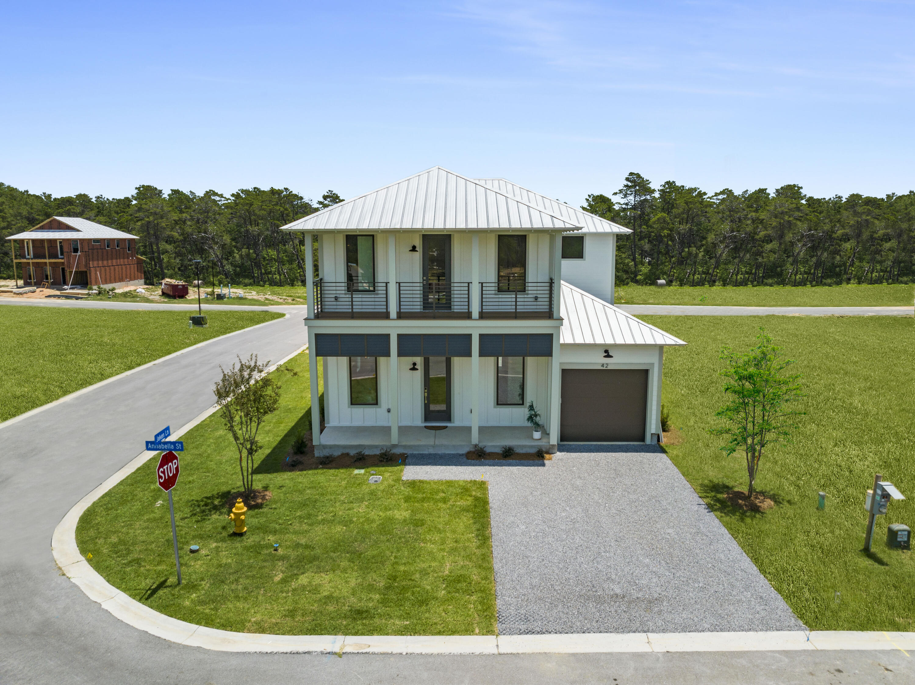 1% Lender Credit towards Closing Costs and or Rate buydown w/preferred lenders! PLUS Ask about our Furnishing options available for purchase w/professional designer! The Traditional Turquoise with 4 King Sized En-Suites each w/WIC, plus 2 powder rms & Large upstairs loft w/optional wet bar (or could be upgraded to 5th bedroom!) Rental Projections of $125K a yr! Meticulous attn to quality is evident w/2x6 exterior walls, cement board siding, metal roof, impact-resistant glass windows/doors. High end finishes: smooth finish drywall, 8' doors, Quartz counters, GE Profile appliances, elegant flooring & lighting. Half a mile to largest public beach access and only mins to 30Avenue, Hwy 98 Underpass & Rosemary Beach! This brand new coastal community by Bluscape Homes is sure to impress! Luxury and family-friendly living are perfectly intertwined in this South Walton premier community that is conveniently located to amazing restaurants, shopping and family entertainment, including 30 Avenue, Rosemary Beach, Lake Powell, Camp Helen Gulf front state park, and access to the largest beach access in South Walton

You are surrounded by all the dining, shopping, and entertainment you could hope for in Inlet Beach and 30A to provide an amazing coastal lifestyle. There is a pedestrian underpass at Hwy 98 for added convenience to access all 30A has to offer without having to cross Hwy 98.

The Turquoise is the perfect answer to an extended family gathering. This plan presents 4 or 5 bedrooms, all with with en suite bathrooms and walk-in closets, a huge upstairs den and powder room, and available wet bar. A large balcony offers a view of the beautiful neighborhood and a great place to enjoy the outdoors. High end finishes throughout including Quartz countertops, GE Profile appliances, optional den with wet bar available, elegant flooring and lighting options, 2 outdoor spaces for relaxation, a garage and ample front parking. If you're looking for a vacation home that gives roomy privacy to all parties, the Turquoise is the one for you. Make this paradise yours and start enjoying the good life.

** Listing includes base price of home and lot premium. Price may vary based on options selected.**