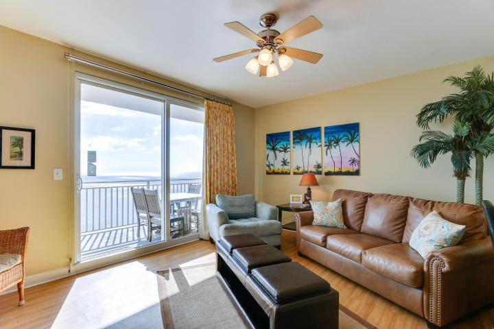 Luxe beachside living at Splash! Excellent rental income producer! Enjoy this beautiful condominium with designer perfect interior and upgrades including hard surface flooring in living area and Master Bedroom, granite counters, and updated furnishings. A spacious Master Suite plus hall bunks and sleeper sofa means this condo easily sleeps 6 plus 2 large bathrooms complete with wood cabinetry and granite counters. Perfect elevation within the stack! Property has been meticulously maintained. New composite balcony furniture will convey. Splash offers amazing resort style amenities including: waterpark, including a kids' pool park with waterslides, interactive water toys, a lazy river ride, ''dive-in'' movie theater, arcade, state of the art fitness center, a pool and Jacuzzi just for the