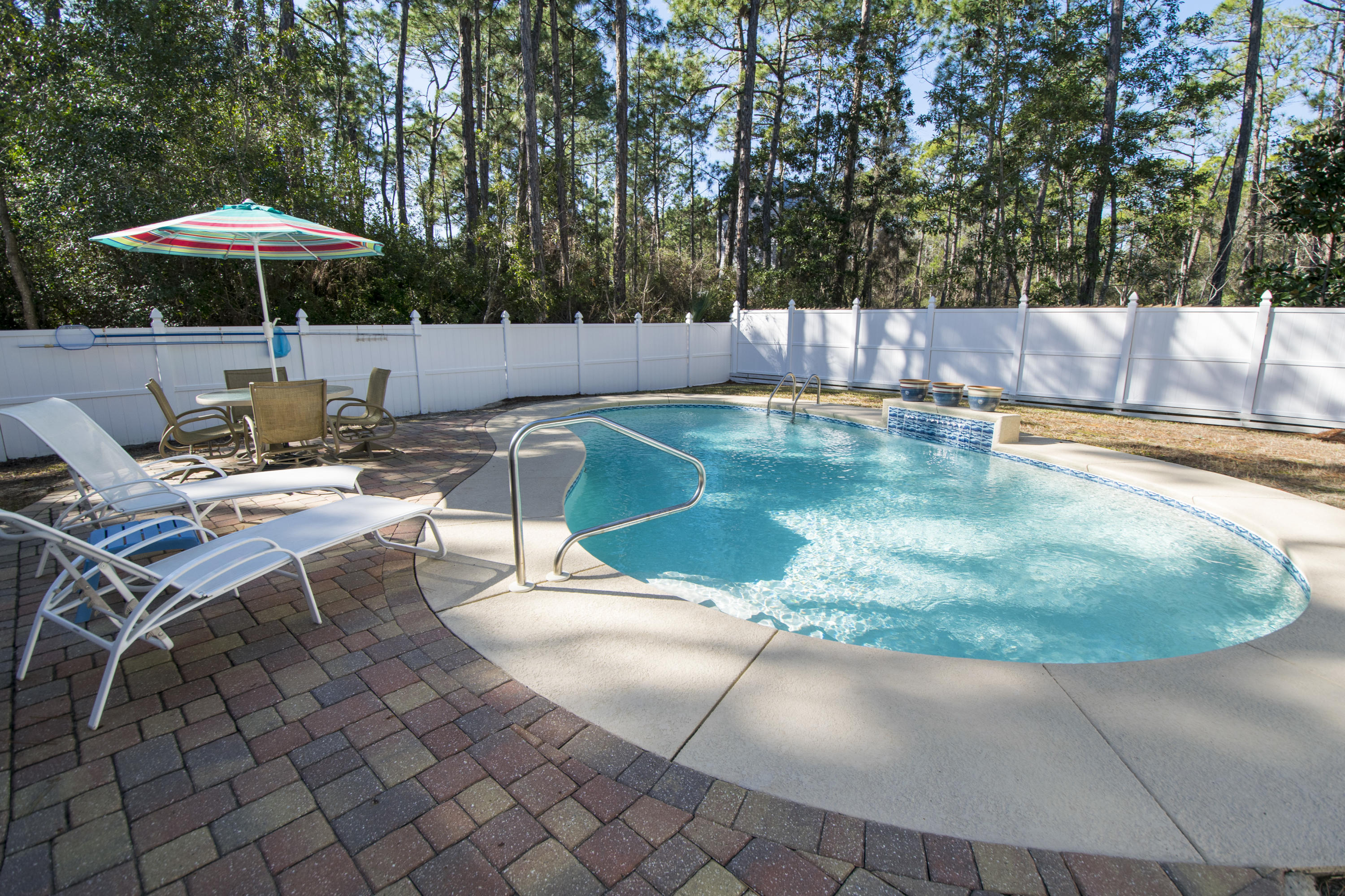 Right in the Heart of Seagrove - The location of this
1568 sq. ft. Florida Cottage offers both convenience & seclusion with easy beach access just across the street. Immaculately maintained with an open floor plan the single level 3bdrm., 2 bath cottage lives big! Relax on the screened porch after a day at the beach or just enjoy privacy of the generous fenced yard and 25' x 18' pool. Low maintenance with no HOA fees, minimizing the cost of ownership. Owner's closet, full laundry room and plenty of parking space. ''Seacliff Cottage'' has a been a favorite family vacation rental & grosses approximately $35,000 from March - Oct. A great option for a 2nd or permanent home. Don't miss your chance to own a cottage within walking distance to 30A's Award winning beaches. Any information and dimensions in this listing is believed to be accurate but not guaranteed.