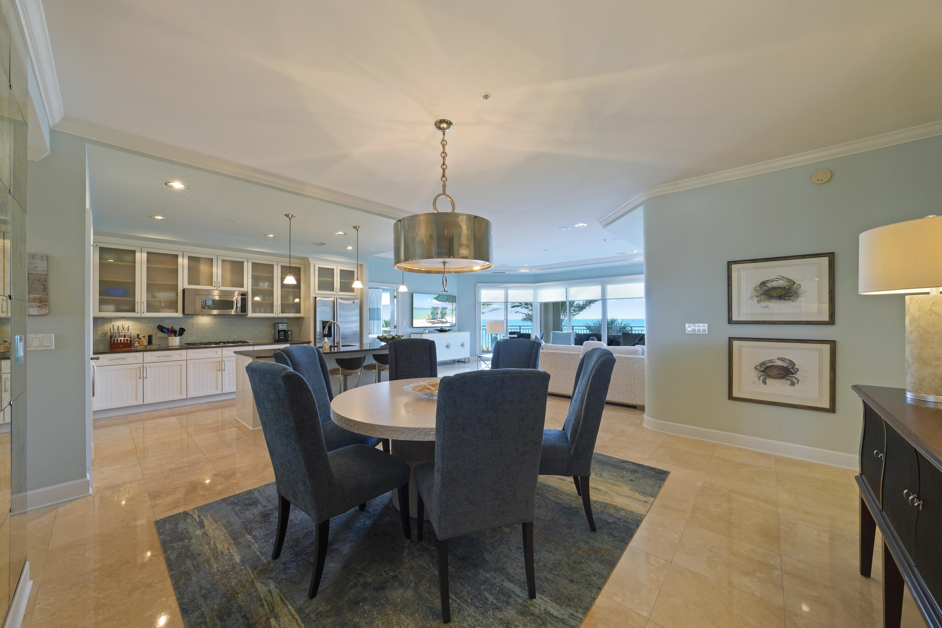 Experience the ultimate beachfront lifestyle in this exquisite, rental restricted, 3 bedroom, 3 bathroom condo in the heart of Miramar Beach. This stunning condo boasts 2,320 sq. ft of living space with breathtaking views of the Gulf of Mexico and offers unparalleled luxury and comfort. This Villa in Grand Dunes is well maintained and perfectly located on the 2nd floor, giving it a 3rd floor elevation and the views are fantastic! It will convey furnished with some exclusions of living room rug and personal items. As you enter the condo, you will be greeted by an open concept living space, which is perfect for entertaining guests. The living area features floor-to-ceiling windows that let in plenty of natural light, and offer panoramic views of the emerald, green waters of the Gulf.  Features of this Villa include: private entry foyer, 9.5 ceilings, 8ft. interior doors leading to the Primary and Gulf front guest, honed, sealed & polished travertine flooring in foyer, living area, kitchen, hallways, and baths, can lighting throughout all living areas, and remote controlled privacy shades in the living and Gulf front room.  This beautiful Villa's HVAC system was replaced in 2019 and the Hot Water Heater was replaced in 2017.
This beautiful Villa also features a gorgeous Chef's kitchen with granite countertops, custom cabinetry with ''soft close'' drawers, subway tile backsplash in the kitchen, premium stainless-steel appliances, "GE Profile" fridge, 5 burner natural gas cooktop, wine cooler, and ice icemaker.  The Primary Suite is a true oasis that offers: "His & Hers" walk-in closets, trayed and coffered ceilings, and a sitting area. The Primary bath offers: dual granite vanities with soft-close drawers, a separate dual head shower, a spa-like jetted soaking tub with travertine surround, and a separate water closet.

Step out onto the balcony and absorb the breathtaking views of the Gulf.  This is an 11' deep Gulf front balcony with over 350 sq. ft of space, a built-in natural gas grill, and all protected by "Hurricane Shutters."

Grand Dunes offers: "Super Quiet Interiors", semi-private elevators leading into the private foyer of your Villa, 24 hour security, gated entry, lush landscaping, 2 levels of gated underground parking for Owners, , private heated pool, Owner's Lounge with Fitness Room, Over-Flow Suites for guests, 200' of deeded beach, a Lagoon Style Gulf Front Grand pool area, lighted waterfall and beach service.

Grand Dunes is the Emerald Coast's Most Desired Rental Restricted Beachfront Development"

Call to schedule your private viewing of this beautiful Villa today!
