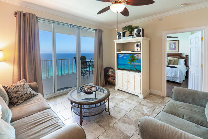 *Your own private assigned under-building parking space! This beach inspired Gulf front 2/2 condo at Emerald Isle is the beach getaway you have always dreamed of! Riveting Gulf views are framed by beautiful interiors, designed with the Gulf of Mexico and sun in mind. Unit will convey fully furnished and rental ready! The gourmet kitchen features granite counters and loads of cabinet space and is fully stocked and rental ready. This condo lives large and is spacious and bright! Master bedroom on the Gulf with access to the balcony through sliding glass doors. Gulf views from master bedroom, living room, dining area, & kitchen! Sunshine and warm gulf breezes abound from HUGE (10X28) BALCONY offering panoramic views as far as you can see to the East and West