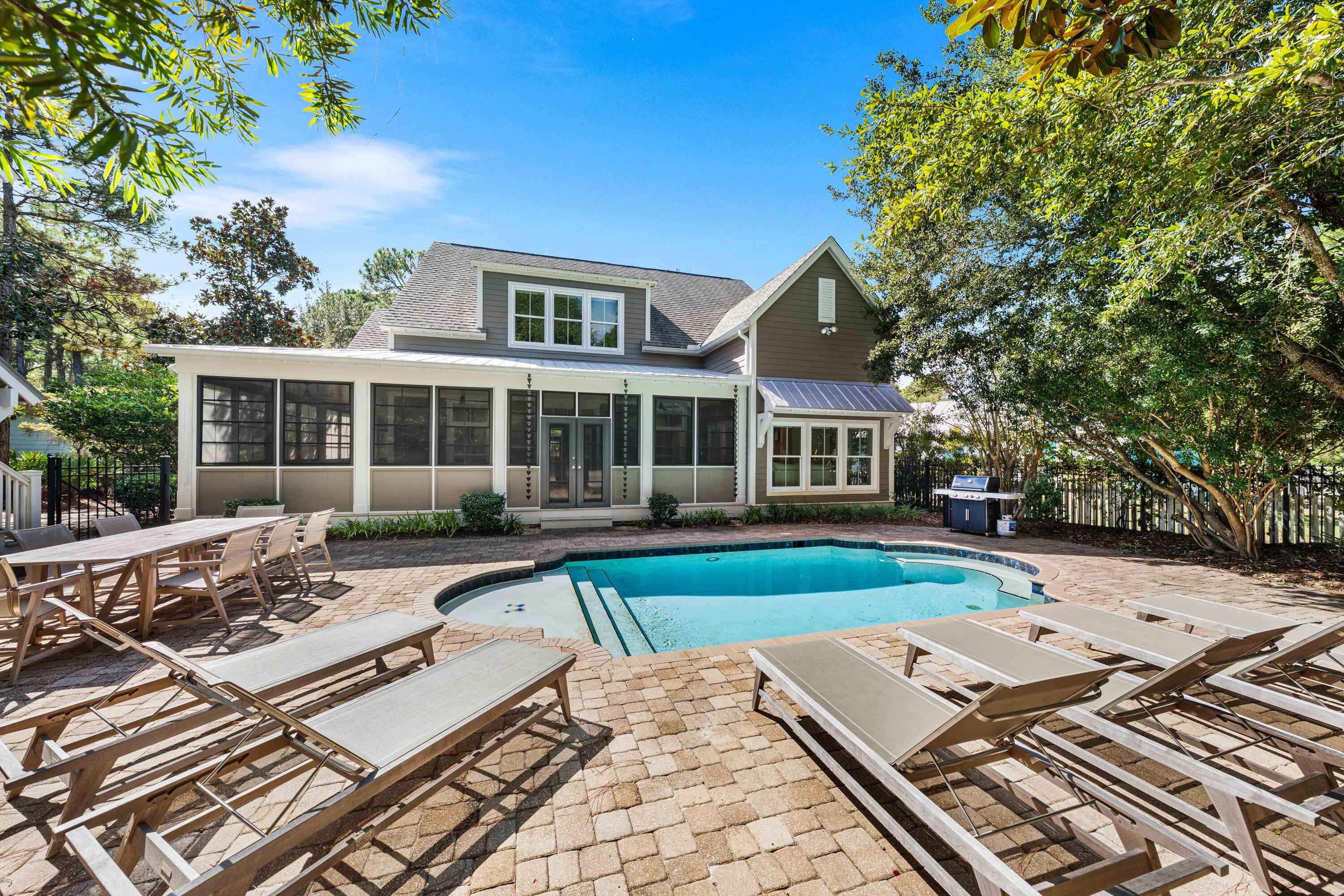 Two minute golf cart ride to street parking in front of the Sugarwood Beach subdivision and 100 steps to the sand at Greenwood Beach Access.  Seagrove beach is arguably one of the best and least crowded beaches that 30A offers.  

This dreamy, rehabbed,  Coastal Cottage, radiates Southern Charm, with breezy oversized wrapped around porches that allow exits on multiple sides including the downstairs Primary suite.  The home was designed to accommodate multi-generational families in a neighborhood with many full time Owners, either second homes, or their forever home, tucked away in this coveted community, backing up to a wooded reserve where you can follow the walking trails, enjoy cruising the Timpoochee Trail, bike ride to Seaside, or cruise and explore 30A from Seagrove to Watercolor,  in your street legal golf cart, that is welcomed in this area.  3,835 sf with 5 bedrooms, one of the downstairs BR could be converted back to a study, new floors and new furnishings, heated pool with great morning sunshine!

Never rented by previous single Owner and lightly rented by current Owner.  With rental projections of $150K+ plus value add opportunity to enhance the property's performance and market value by converting finished area above the garage in to a carriage house (see docs).  Consult your CPA about taking advantage of 100% bonus depreciation.  

 Sugarwood Beach is an authentic Seagrove Beach community that offers large lots and low HOA fees. With just 65 homesites the Sugarwood Beach community has the character and charm of an established Florida Gulf Coast neighborhood.
