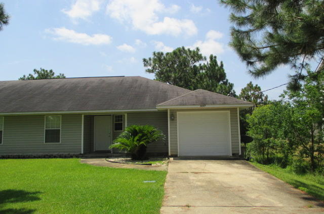 Spacious 3 bedroom 2 bath home-split floor plan in the front of Holley By The Sea. Excellent condition, high ceilings, plant ledges, breakfast bar and neutral colors throughout. Sliding glass door leads to fully fenced yard. Usage of RECREATION CENTER with Pools, workout room, tennis and many other amenities. No pets allowed.