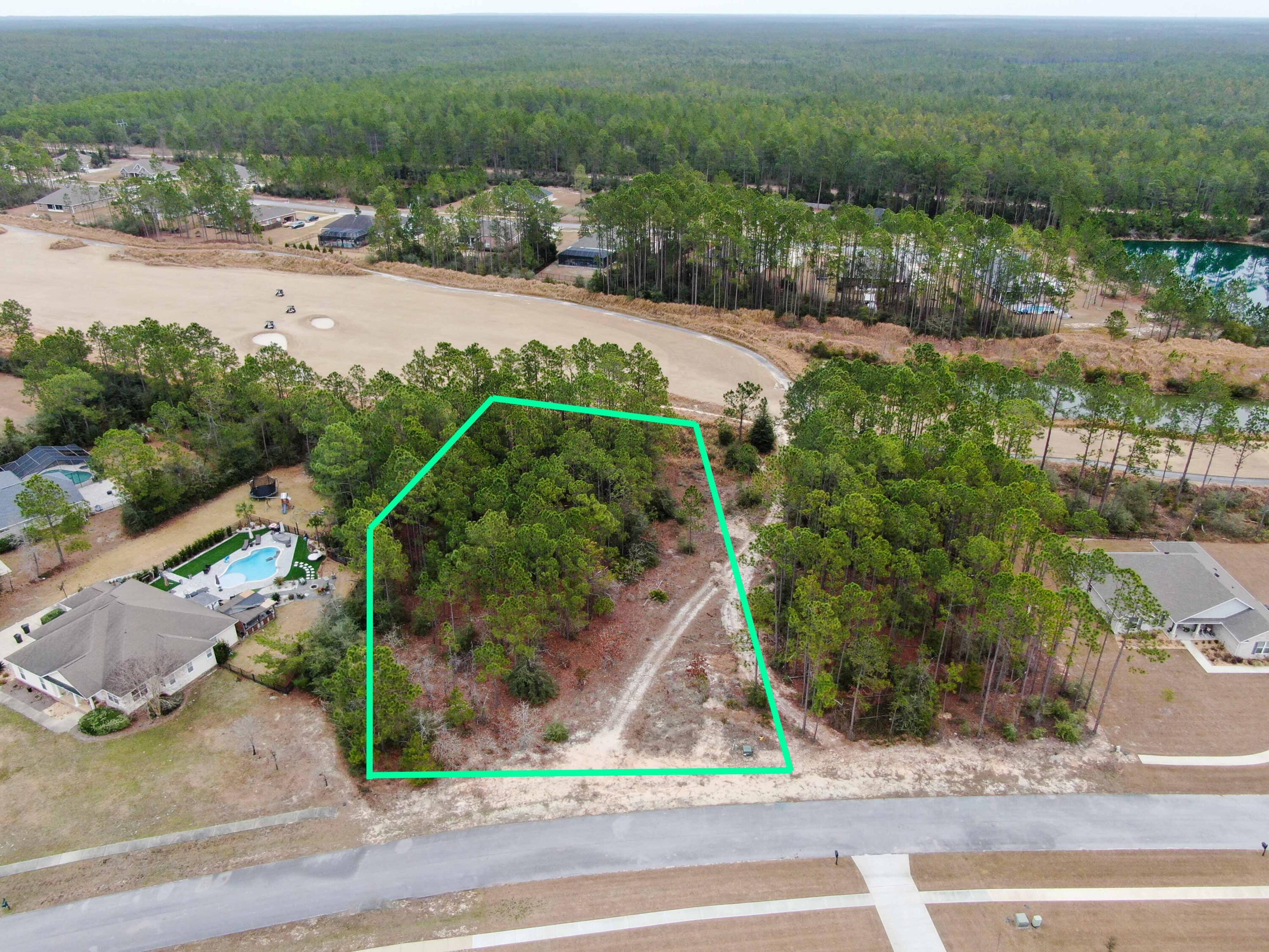 Discover an exceptional opportunity to create your forever home on this expansive 0.80-acre homesite within the gated enclave of Windswept Estates. Tucked away on a quiet cul-de-sac, this property offers a rare sense of privacy and tranquility surrounded by natural beauty. Ideally located, enjoy effortless access to the best of the Emerald Coast, just 20 minutes from the sugar-white beaches of 30A, 10 minutes from the Choctawhatchee Bay, and approximately 15 minutes from Northwest Florida Beaches International Airport. Perfectly positioned between Destin and Panama City Beach, Windswept Estates delivers refined coastal living with the luxury of space, seclusion, and convenience.