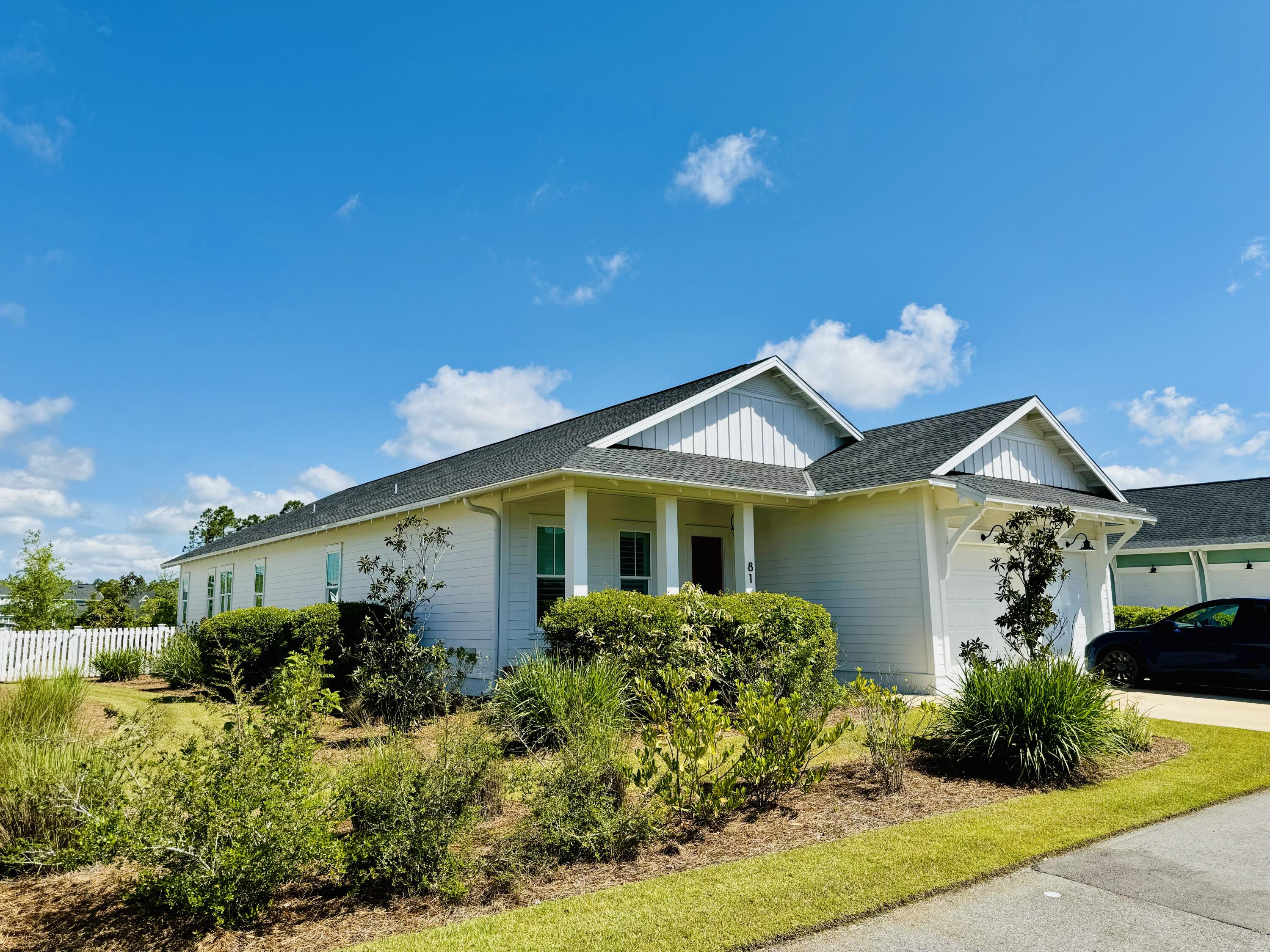 Newer-built, one-level home in Watersound Origins, 4 bed/3 full baths + extensive upgrades.  2,226 sq ft, 10-foot Ceilings & 8-foot Doors + gas lantern front porch, Tesla Charger in garage, a screened-in back porch that opens to an IPE wood entertainment deck w firepit. 4 1/2'' Plantation Shutters, WOLF Range, Bosch Refrigerator & Dishwasher, Sharp Drawer Microwave, Vent Hood, Quartz Countertops, 7 Surround Sound In-Ceiling Speakers in Living Room for Immersive Sound + 2 In-Ceiling Speakers in Porch, Undersink-installed Kohler Water Filtration System, Dry-Bar w Lighted Cabinets, Solid Core Doors, Crown Molding Throughout & Wood Floors. Outdoor upgrades include a large, fenced-in, manicured, private back yard with a IPE-wood entertainment deck & concrete gas firepit and installed gutters.