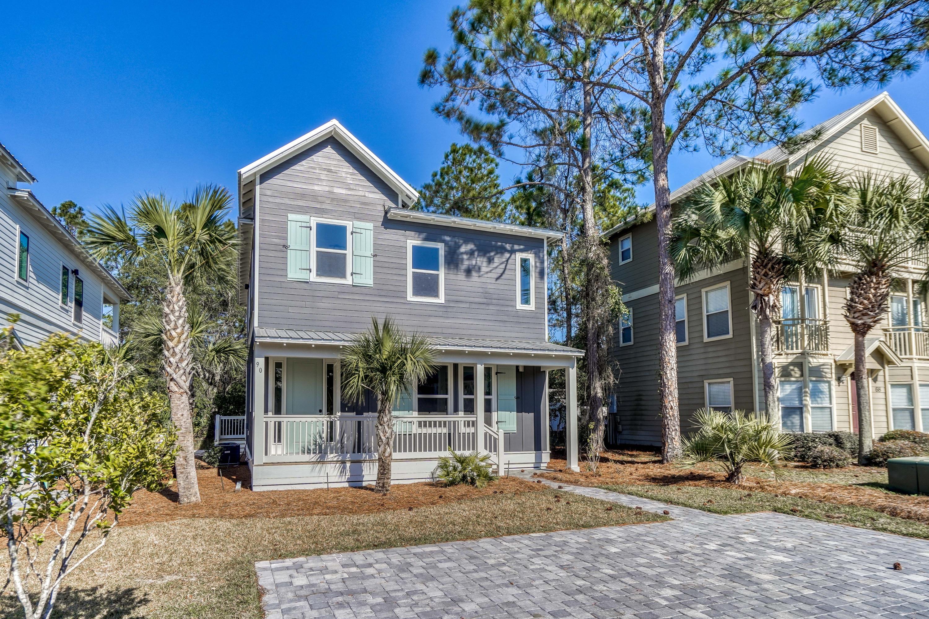 This NEW beach home is located south of 30A, in Blue Mountain Beach! If you are looking for a vacation investment, second home or a primary residence, this home will check all the boxes. Enjoy the convenience of being within walking distance to beach access, restaurants and fabulous shopping. The home features beautiful hardwood floors throughout, stylish lighting and plumbing fixtures, raised ceilings and two large porches. On the first floor there is a spacious living room, dining room, bedroom with a full bath and stunning kitchen. The bedroom on the first floor also has private access to the large back porch. On the second floor there is a large bedroom with private bath and two additional bedrooms that share a full bath. Two of the bedrooms on the second floor have private access to the large back balcony. There is a perfect combination of indoor and outdoor living space. This home is truly a must see if you are seeking the 30a lifestyle!