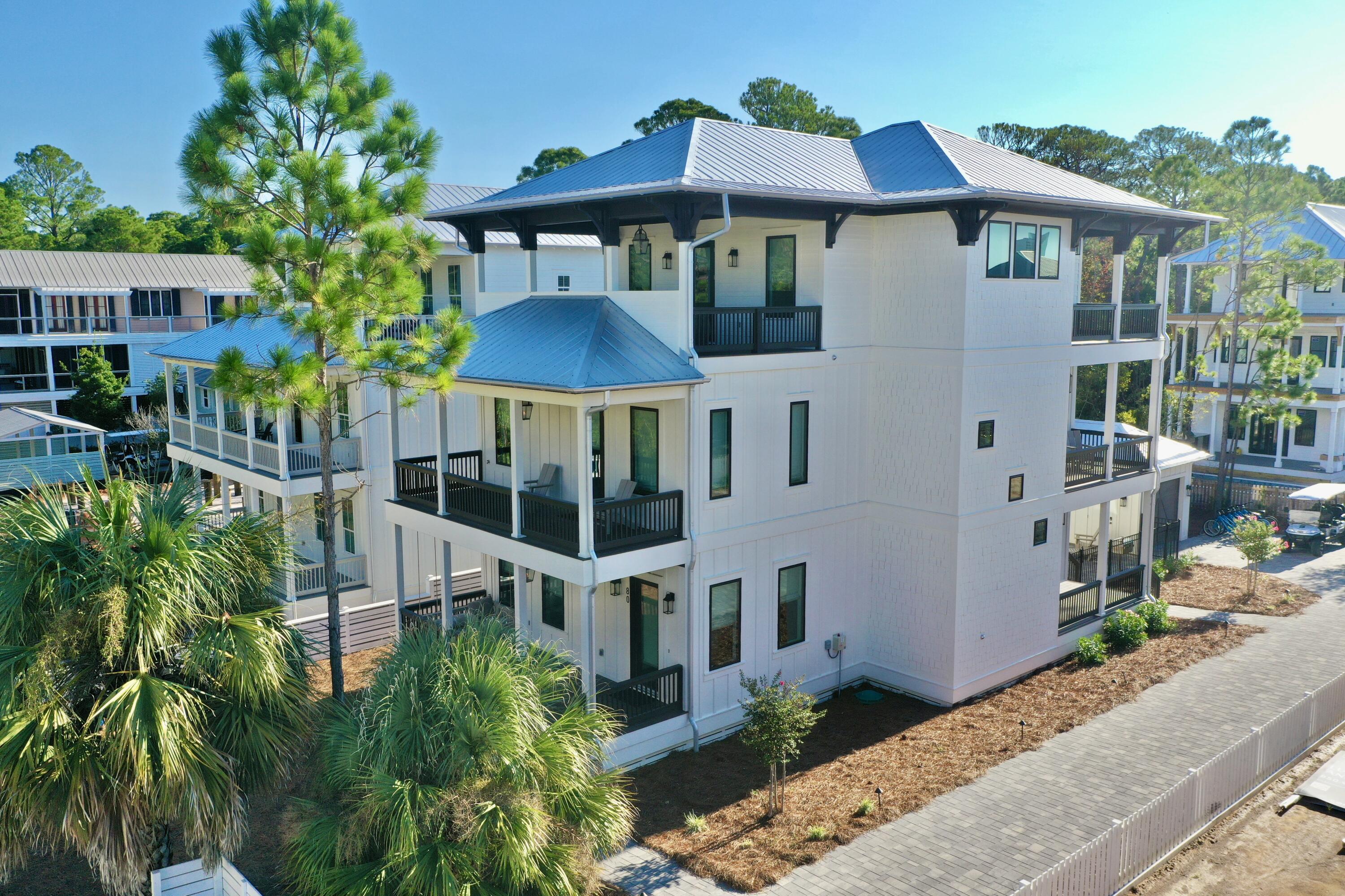 Gorgeous brand new (2024), fully furnished coastal luxury home with 6 bedrooms, 6 bathrooms, 2 half bathrooms, an elevator, ample parking and a detached single car garage less than a 3 minute walk to the beach! This 3,692 sq. ft. home on Montigo Avenue in Seagrove Beach will comfortably sleep 22 people, and the rental projections exceed $215K annually. Designed with entertaining and families in mind, the first floor features the large, inviting great room with a designer kitchen, oversized island and beautiful dining room. Enjoy a gas stove, two dishwashers, farm sink, Mongram Appliances and seating for five at the island. The first floor also includes a bedroom suite with a private bathroom and a half bath. Outdoor entertainment rounds out the first floor with a beautiful patio, pool and deck area just outside the living room doors. The detached garage provides privacy, in addition to pool storage. Back inside, take the stairs or elevator to the second floor to find the main guest suite floor. There are three guest suites with private bathrooms and a fourth guest suite with a hallway bathroom. The master suite awaits your arrival on the third floor, featuring vaulted ceilings, generous closet space, and a gorgeous master bathroom with a soaking tub, shower and double vanity. The third floor also hosts the entertainment room, large laundry room and additional half bath. Enjoy oversized patios and outdoor gathering areas throughout the home. Seagrove Beach is located along the famous 30A corridor in South Walton. Enjoy endless dining, shopping, arts and attractions close by, not to mention white sand beaches and the emerald waters of the Gulf of Mexico less than a three minute walk from the home.