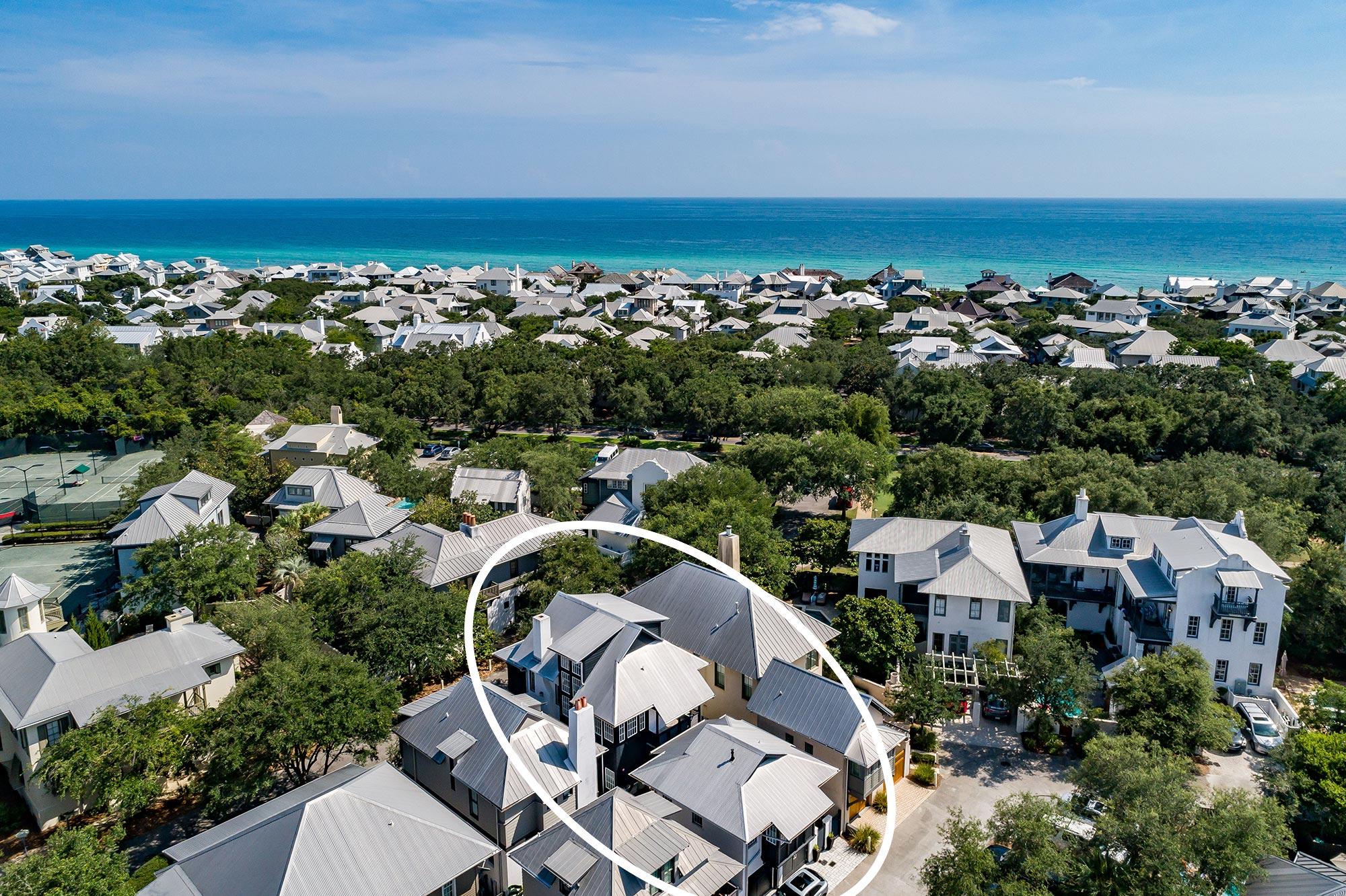 This sleek modern Rosemary Beach residence boasts exquisite interiors paired with an innovative floor plan to give this home an inviting space to live your best life at the beach.  The property is in impeccable condition, as it has never been rented.  This home is all block and stuccoed construction with Pella storm grade windows that allow an abundance of natural light to fill the house.  Designed with an easy flow from room to room, this home also features designer and high-end finishes throughout.  The first floor houses the open concept living and dining area with fireplace and built in seating, along with the gourmet kitchen featuring Quartz countertops and custom backsplash.  From the kitchen, step out into the  back courtyard with a covered loggia that borders the heated salt-water dipping pool.  You may also access the spacious carriage house from the back patio.  This separate guest quarters contains a full kitchen, dining and living area, along with bedroom and private balcony. On the second floor of the main house you can find the master suite with large private bath and generous walk-in closet.  A guest bedroom with ensuite bath and built-in closet is also located on the second floor. The third floor has a landing with space for an office or bunks and a guest bedroom with ensuite bath.  This immaculate residence has been lovingly and meticulously cared for with sharp attention to detail. Rosemary Beach embraces the principles of traditional town planning with a pedestrian friendly design. With its brick-lined streets, charming town center, unique shops and locally-owned cafes, locals and guests alike delight in this picturesque 30A community.