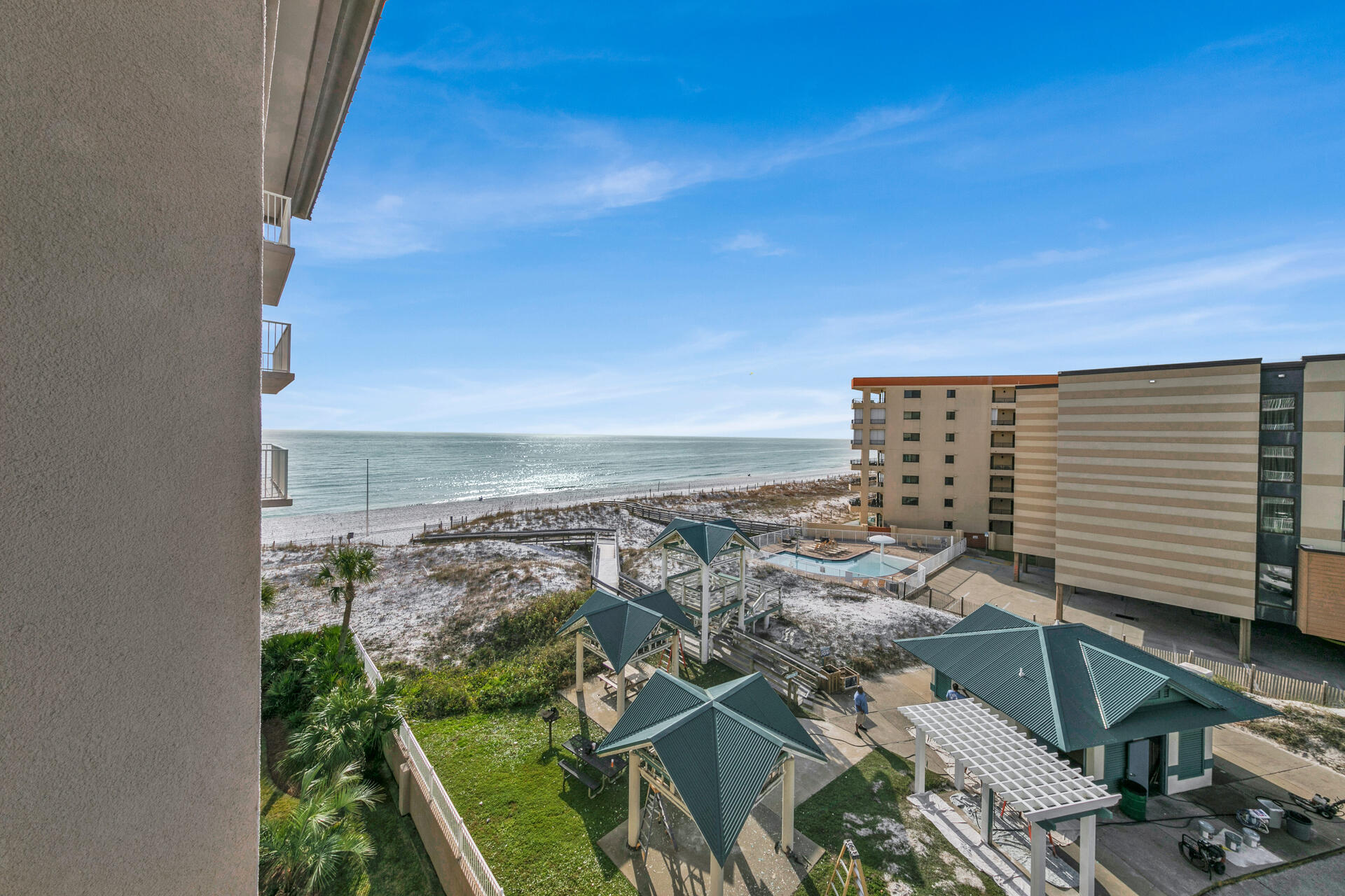 !! SELLER IS A PAYING SPEICAL ASSESSMENT !!   EAGER FOR OFFER !! This lovely condo is your ticket to the fabulous beach lifestyle. Great view of the beach from the balcony. This owner has never rented the condo so it's in great shape and ready for you and your family to make vacation memories. Furnished except for a couple of lamps and a liquor cabinet. You can also cash in $$$ on vacation rentals if desired. Heated pool, fitness center , and beach access are just some of the amenities. Many fun attractions in the area. Beach service and one assigned covered parking spot are included. Balcony access from master bedroom.  HVAC and appliances replaced in 2017. Buyer to verify all information.