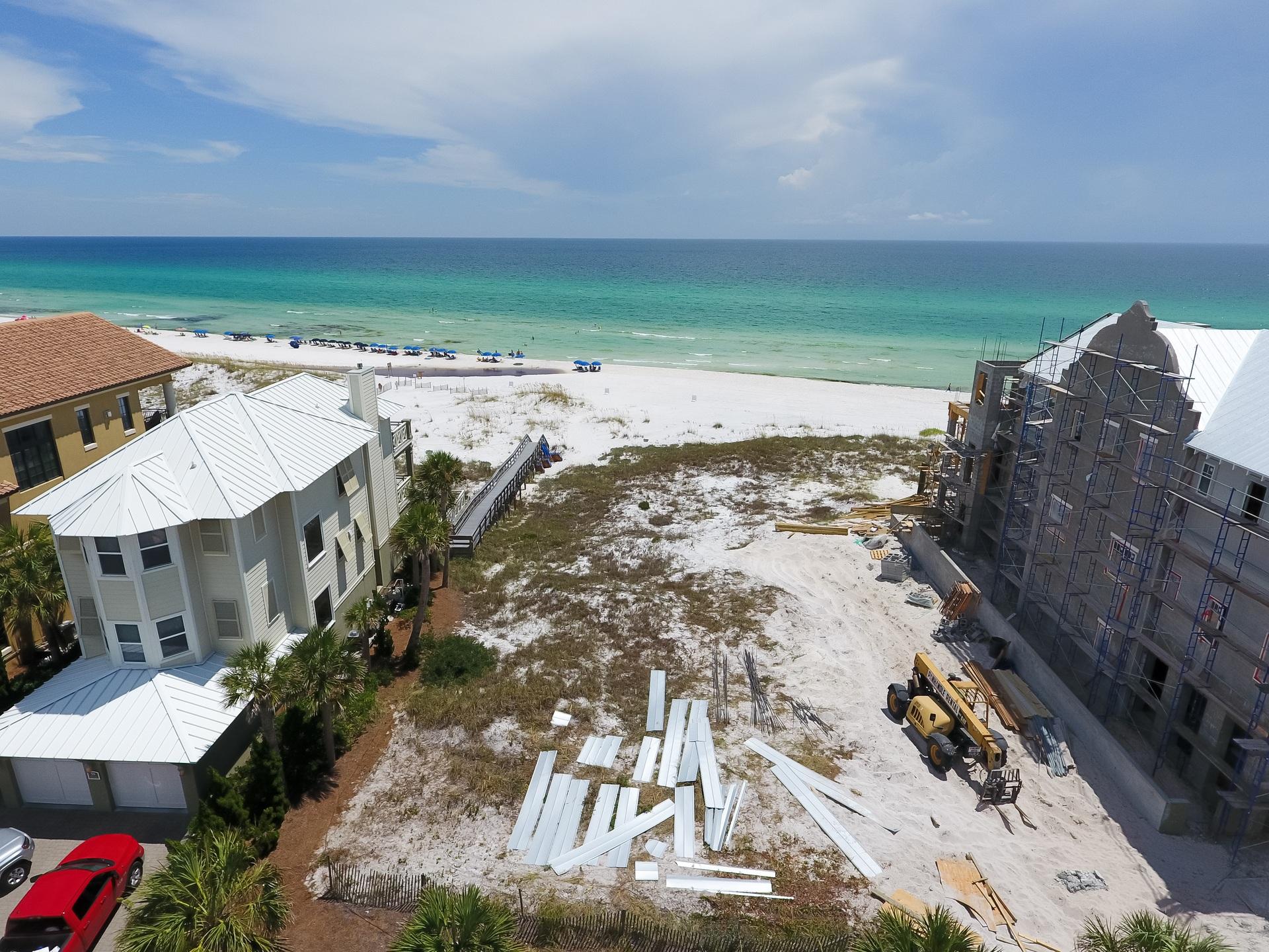 Incredible Gulf front lot in the exclusive subdivision of Deer Lake Dunes adjacent to Deer Lake State Park in Seagrove Beach. The lot is quite impressive with over 1/2 an acre (0.612) and approximately 50 ft. of water frontage with breathtaking panoramic views of the beautiful Gulf of Mexico & Deer Lake State Park. This is a unique lot with depth totaling apx. 500 feet! Plenty of room to build your dream home including a private beachfront - the lot goes all the way to the water's edge (mean high water line). Deer Lake Dunes is low-density community adjacent to Deer Lake State Park and nearby Eastern & Deer Lakes, rare coastal dune lakes for recreation. The natural habitat makes this lot very serene and peaceful. Lot 5 has fantastic sand dunes on the lot for added protection from storms. There is a private beach boardwalk that is shared with the immediate owner to the left - this is dedicated for just these two lots. You are in close vicinity to award winning restaurants, local shops & art galleries and entertainment. Seaside is also close by with eclectic airstream food trucks, an amphitheater, farmer's markets, Modica Market, Amavida coffee shop and more. If you prefer to explore nature, just stay in the community and have a picnic at Deer Lake State Park, hike or bike the nature trails or paddle board the coastal dune lakes. You have the private and relaxing environment you have been looking for with just a quick drive to the action. Do not miss out on this opportunity to build your dream home in one of 30-A's most exclusive communities.