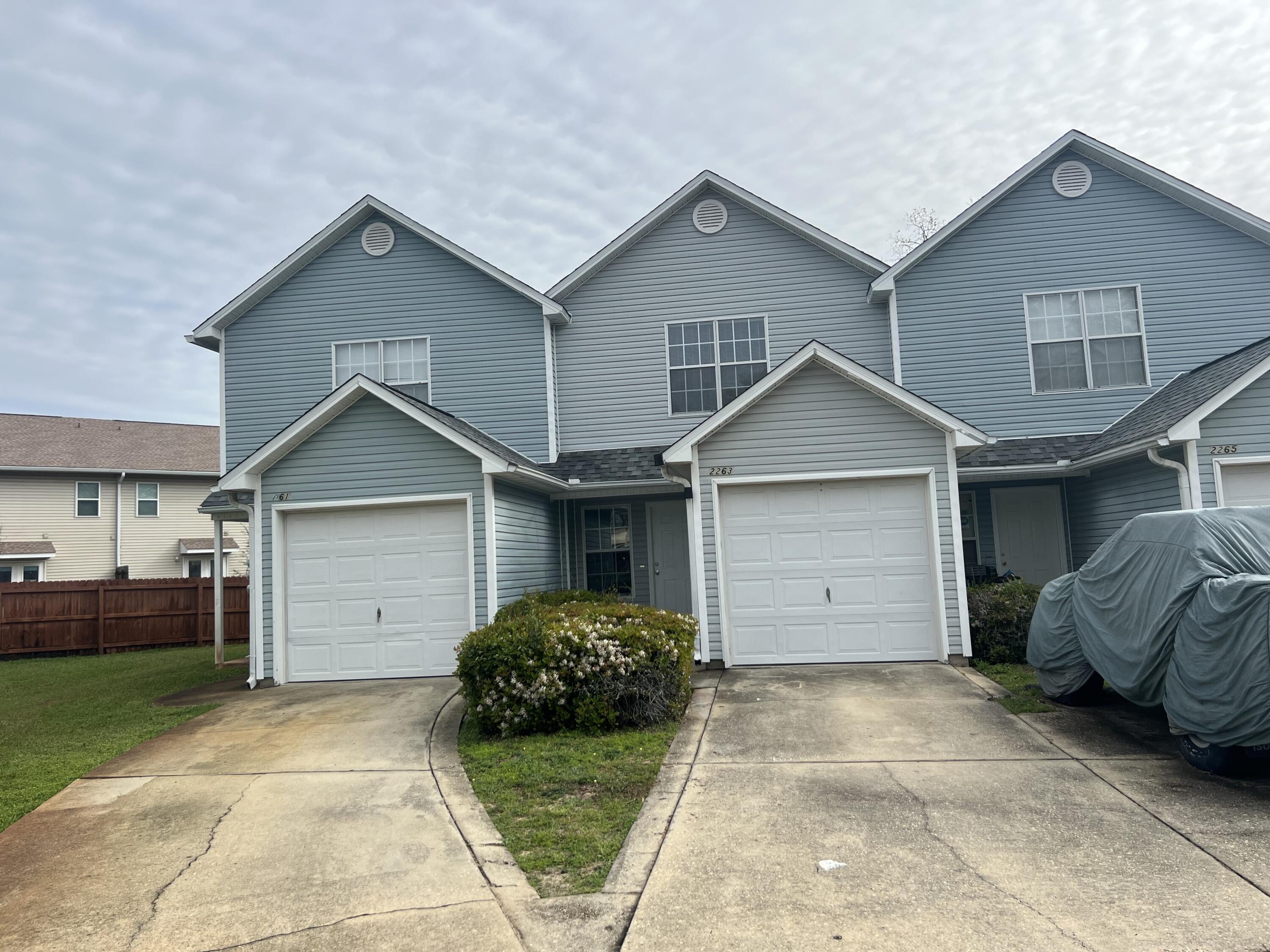 Spacious two bedroom townhouse with garage at end of cul-de-sac and just off Racetrack Road. Has living/dining combination with extended breakfast bar. Half bath downstairs with each bedroom having it's own private bath. Yard service included. With an approved pet application, owner will allow up to two pets fully grown(50lbs or less) with a $350 non-refundable pet fee for each pet.   . All Coastal Realty Services residents are enrolled in the Resident Benefits Package (RBP) which includes renters insurance, HVAC air filter delivery (for applicable properties) and our best-in-class resident rewards program, and much more! More details upon application.