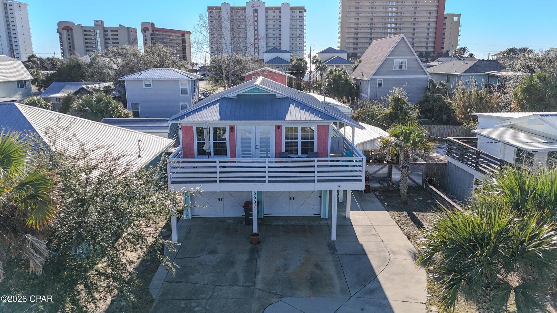Coastal Living Meets Turnkey Investment Opportunity Welcome to this freshly updated 3-bedroom, 3-bath beach retreat, perfectly positioned within walking distance to the beach and just minutes from top local attractions, dining, and entertainment. Thoughtfully renovated with modern finishes and coastal charm, this home is designed for both relaxed living and strong rental performance. Proven rental history with over $60,000 in rental income in 2025 makes it a standout investment in a highly desirable beachside location ''WITH NO HOA''. The open-concept layout offers spacious living areas, a well-appointed kitchen ideal for hosting family, friends, or guests. Each bathroom has been tastefully updated, providing comfort and privacy for everyone. Whether you're seeking a primary residence, vacation home, or income-producing property, this home delivers.