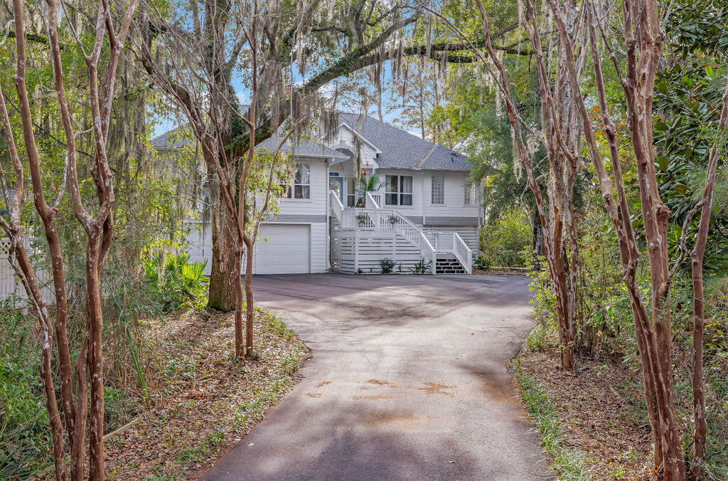 PRICE IMPROVEMENT! Rare 108 ft of private bayfront with NO HOA on 1.56 acres.
Welcome to your bayfront paradise featuring a beautifully updated 4-bed, 2.5-bath home with an open floor plan, cathedral ceilings, hardwood floors, and a stunning kitchen with a granite island, double oven, and smart appliances. The primary suite offers unbeatable bay views, vaulted ceilings, and a spa-like bathroom with dual shower systems.
Step outside to a 16x62 wraparound deck overlooking the Choctawhatchee Bay, a private sandy beach, and a dock with a gazebo, perfect for sunset watching, fishing, and water days. Upstairs features four spacious bedrooms with panoramic bay views and hardwood floors.
Downstairs offers an oversized 2-car garage, workshop/gym space, and an air-conditioned bonus room. The covered patio includes turf, grilling space, and an 800 lb cargo elevator.

Enjoy direct access to Crab Island, world-class fishing, and nearby restaurantsplus incredible rental potential without HOA restrictions. This is a rare chance to own a secluded bayfront retreat where every day feels like vacation.