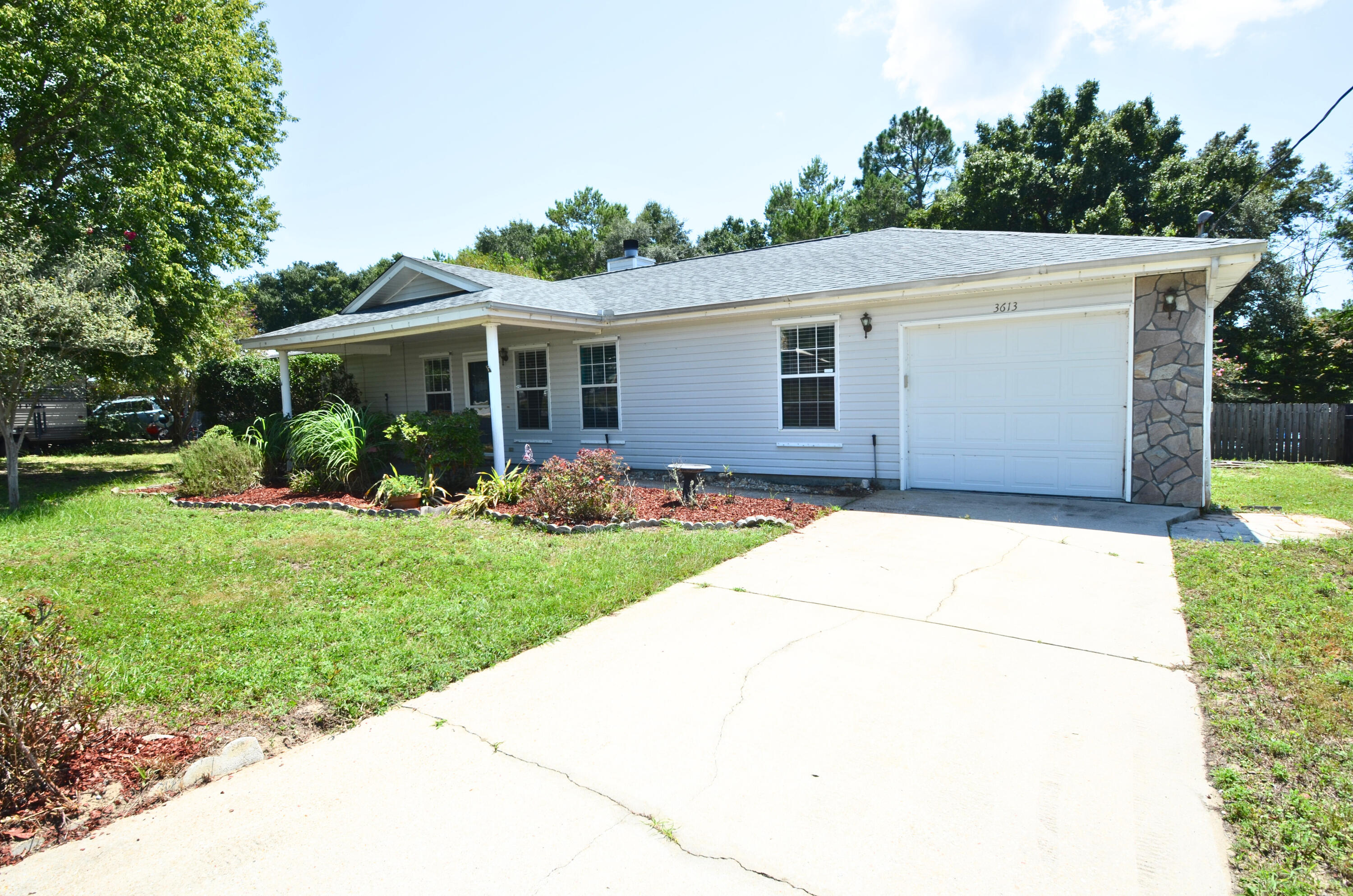 lluminated by the golden Floridian sun, 3613 Burton Cir in Navarre is a captivating retreat that promises both comfort and charm. This delightful 3-bedroom, 2-bathroom home sprawls over 1,566 square feet, offering ample space for relaxation and entertainment. As you step inside, you're greeted by an inviting atmosphere that creates an ideal sanctuary for unwinding after a long day. The open floor plan seamlessly integrates the living areas, encouraging a natural flow from room to room. Outside, the large backyard is fenced in. Cats and Large dogs (up to 50lbs fully grown)  accepted with $350 pet fee per pet and 10 per month pet rent for each pet. Residents are enrolled in the Coastal Realty Services Resident Benefits Package (RBP), which includes renters insurance, HVAC air filter delivery, a resident rewards program, and more!

Please contact the office (not the listing agent below) directly at 850.244.2100 for additional information. Showings can be scheduled via the website www.CoastalRealtyServices.com. Prior to us processing an application on a rental property, we do require the rental to be viewed by the applicant or a representative of the applicant.
