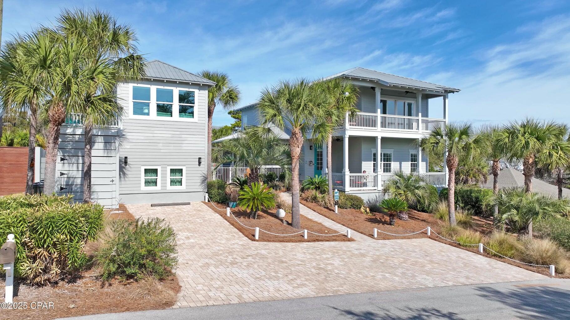 Salty Dunes - POOL!! Luxurious 7-Bedroom Coastal Retreat in Blue Mountain Beach** Welcome to Salty Dunes, an extraordinary 7-bedroom, 5.5-bathroom beach home in the heart of Blue Mountain Beach, offering the perfect blend of luxury, comfort, and coastal charm. With enough space to comfortably sleep 19 guests, this stunning property is ideal for large families, group getaways, or a high-income vacation rental investment. Prime Location - Just 1/4 mile from the sugar-white sands of the Emerald Coast, you're only a short stroll or golf cart ride from the breathtaking Gulf waters. Spend your days lounging on the beach, biking the scenic 30A trails, or indulging in the area's best shopping, dining, and entertainment. A Home Designed for Relaxation & Entertainment From the moment you arrive, the salty sea breeze and lush tropical landscaping welcome you to your dream getaway. This two-story beach retreat features double-decker wrap-around porches, providing the perfect spot to sip morning coffee or unwind in the evening. Step inside to find bright, beachy décor and an open-concept layout, seamlessly connecting the living room, dining area, and fully equipped kitchenideal for entertaining. The first-floor primary suite offers a king bed, spa-like en suite bathroom with a soaking tub and walk-in shower, plus private access to the backyard oasis. Upstairs, discover six more beautifully appointed bedrooms, including a second spacious suite with a king bed, private kitchenette, and access to the second-floor porch. A bunk room for the kids, additional queen bedrooms, and multiple updated bathrooms ensure plenty of space and comfort for every guest. Bonus Spaces - Pool House & Carriage House Need extra room? Salty Dunes offers two detached living spaces for added privacy. - The Pool House includes a TV lounge, arcade machine, and lofted queen bed, making it a perfect hangout for teens or young adults. - The Carriage House, located above the garage, features a cozy living area, kitchenette, queen bedroom, and private batha fantastic retreat for guests who prefer their own space. Backyard Paradise - Private Pool, Screened Porch & More. Step outside to your very own private fenced-in oasis, complete with a sparkling pool (heating optional), screened porch, sundeck, and gas grill for unforgettable gatherings. Rinse off in the outdoor shower after a day at the beach, or hop on one of the complimentary bikes or golf cart to explore the scenic 30A area. The Ultimate 30A Lifestyle Awaits Beyond the home's incredible features, Blue Mountain Beach offers a laid-back coastal vibe, award-winning dining, charming boutiques, and endless outdoor activities. Whether you're here to relax by the waves, bike the trails, or experience 30A's vibrant scene, Salty Dunes delivers an unforgettable beachside experience. Now Available - Don't Miss Out on This Stunning Beach Home Whether you're looking for a dream vacation home, a prime rental investment, or your own slice of paradise, Salty Dunes is the perfect opportunity. Schedule your showing today.