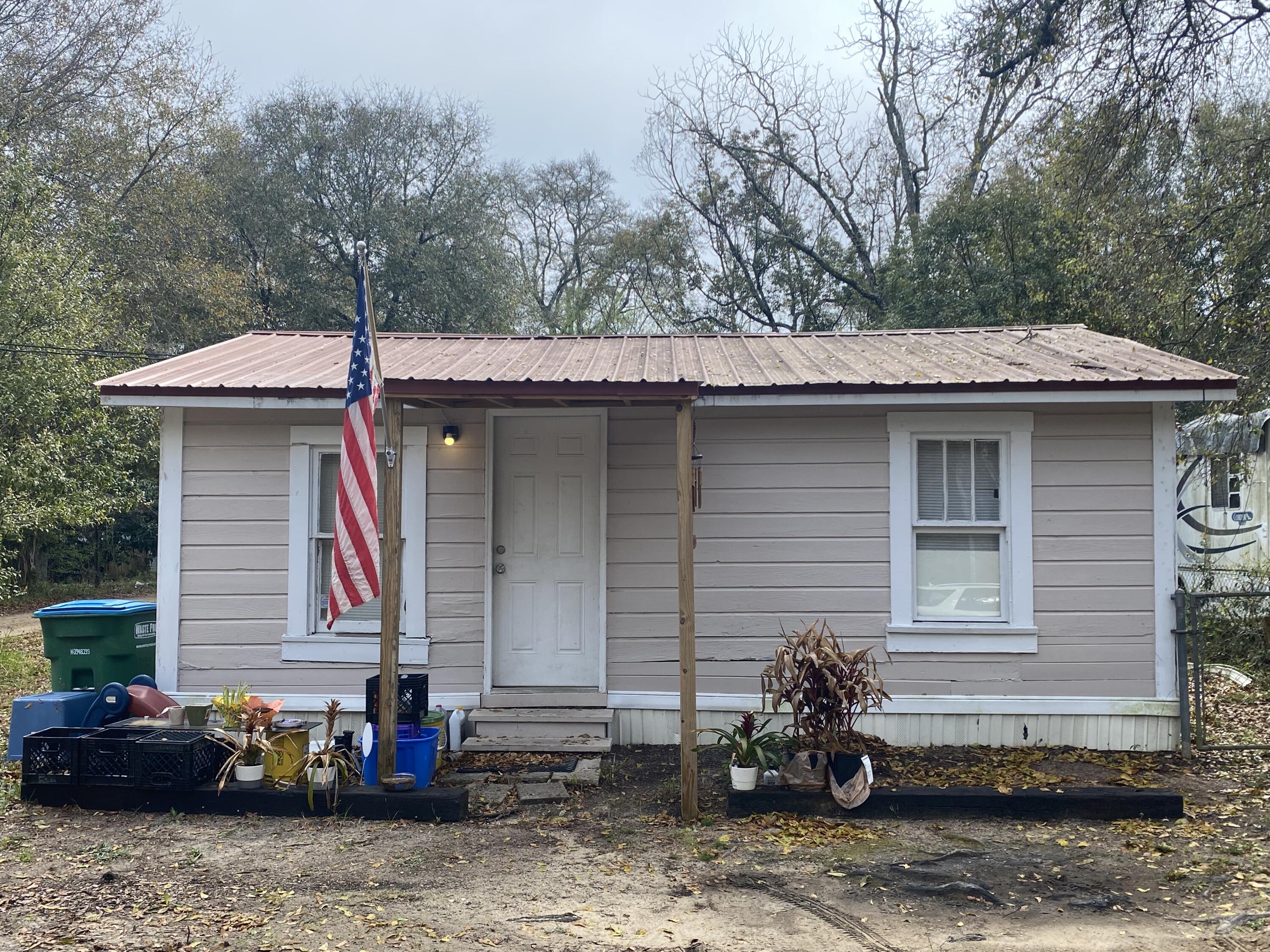 CASH ONLY- INVESTOR SPECIAL! Tenant in place till September at $700/month. Do not disturb. Small off- grade, cottage style home. Good cash flow investment. Will not qualify for financing and is priced accordingly.