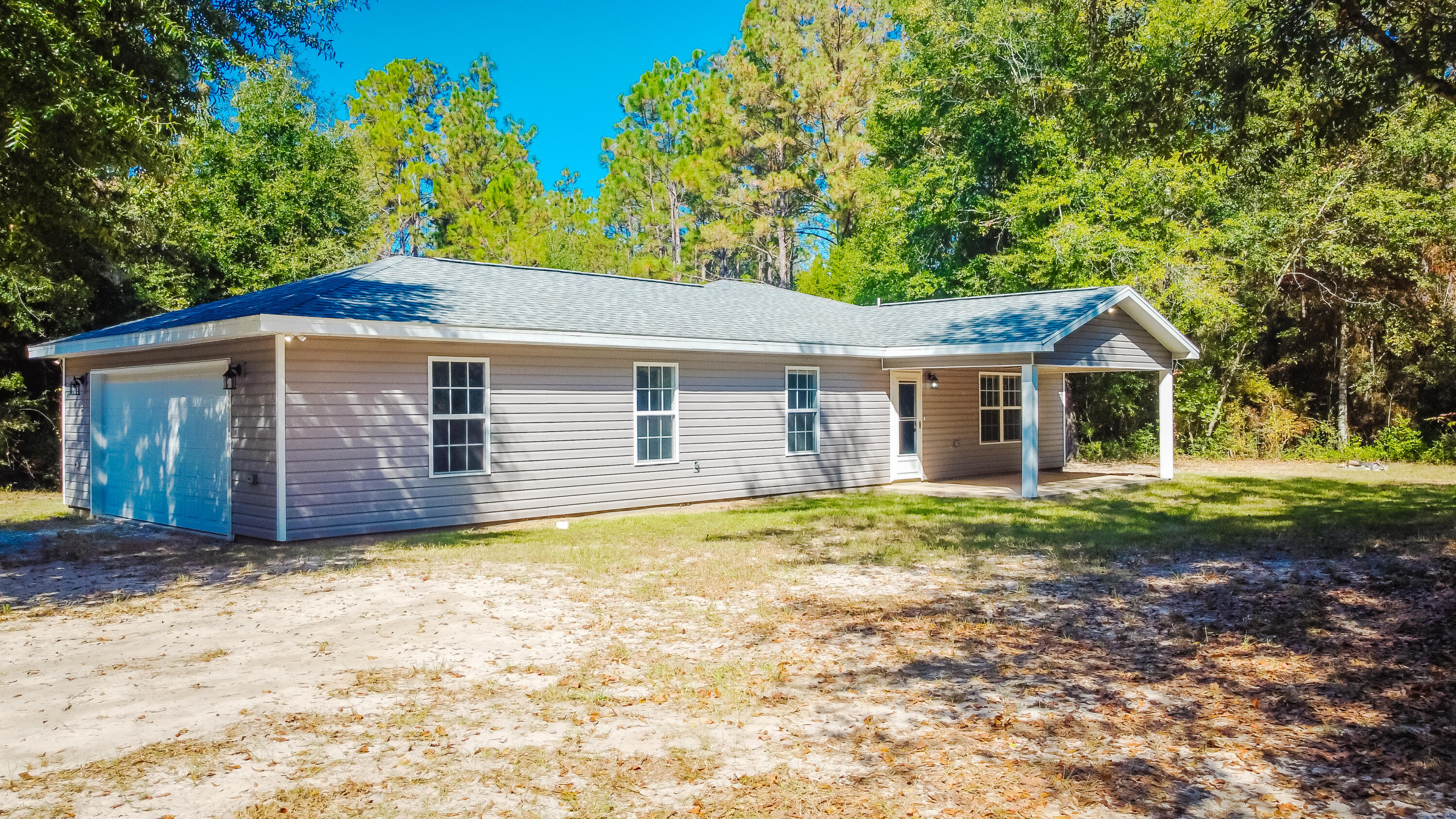 Discover the perfect blend of privacy and convenience with this 34-acre homesite, featuring a quaint two-bedroom home and two picturesque spring fed ponds stocked for fishing.  This property is an ideal retreat for nature lovers and those seeking tranquility while remaining just 19 miles from downtown Crestview.  This acreage is ready for expansion additional electric hookups and with a cleared flat building space, making it perfect for building additional structures or your dream home, or three separate lots.  There is an RV pad, deep well, fiber optic(7gig) cable with high-speed internet and home has been hardwired for security cameras.  Large enough for homesteading, livestock, or just fishing, kayaking, and swimming.  Contact me today to see this peaceful oasis.