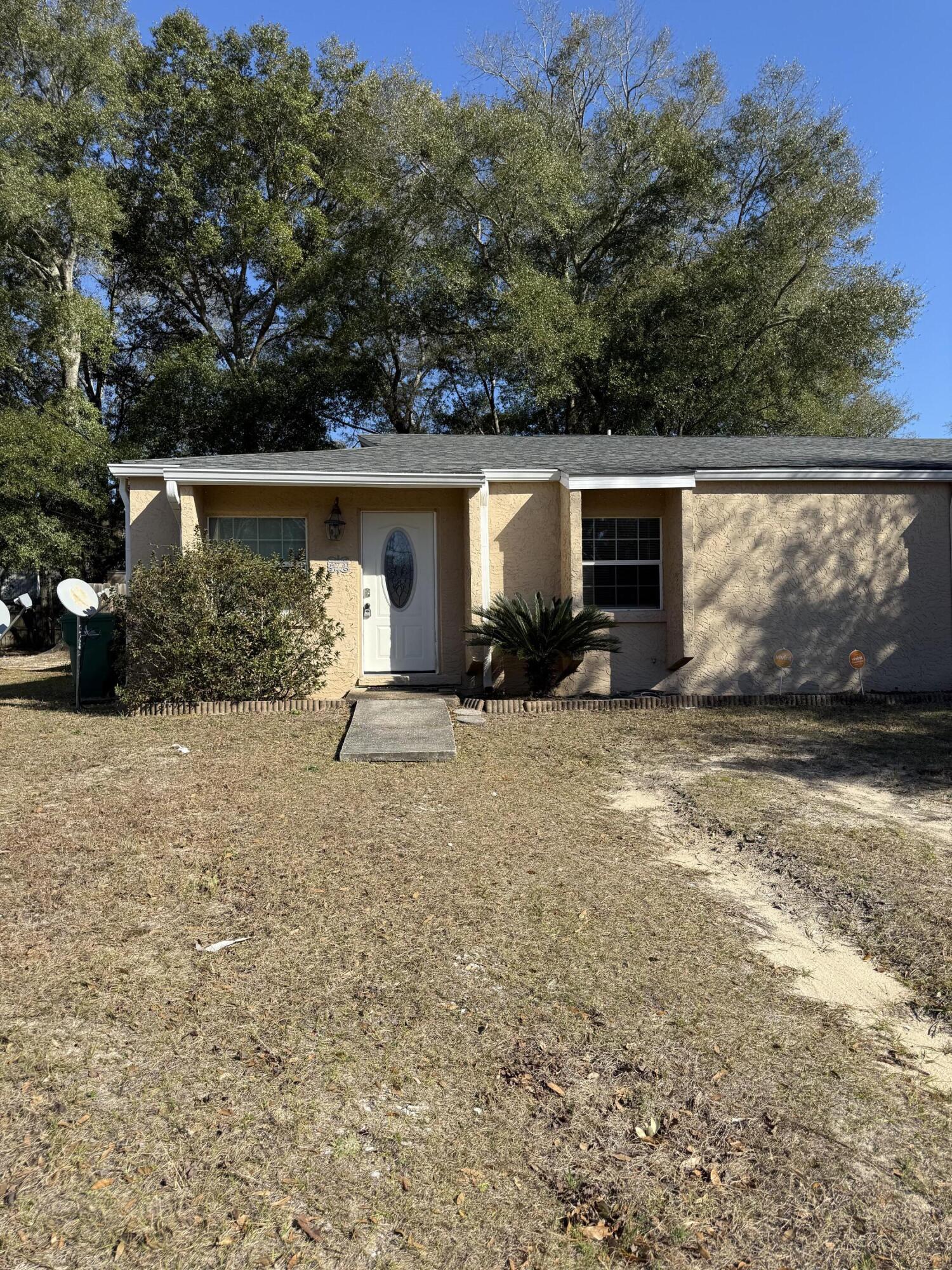 Welcome home to this updated 2-bedroom, 1-bath duplex located in the heart of Fort Walton Beach! This charming rental offers a fully fenced private backyard—perfect for gardening, relaxing, or hosting backyard cookouts. The interior offers a cozy, refreshed living space, while the washer hookup is conveniently located in the outdoor storage room on the covered back porch, adding functionality without sacrificing indoor space. Pets are welcome (breed restrictions apply) making this home even more inviting. You'll love the prime location, just minutes from restaurants, shopping, and everyday conveniences, with Eglin Air Force Base and Hurlburt Field nearby for an easy commute. If you're searching for a well-located rental with outdoor space and thoughtful updates, this duplex is a must-see!