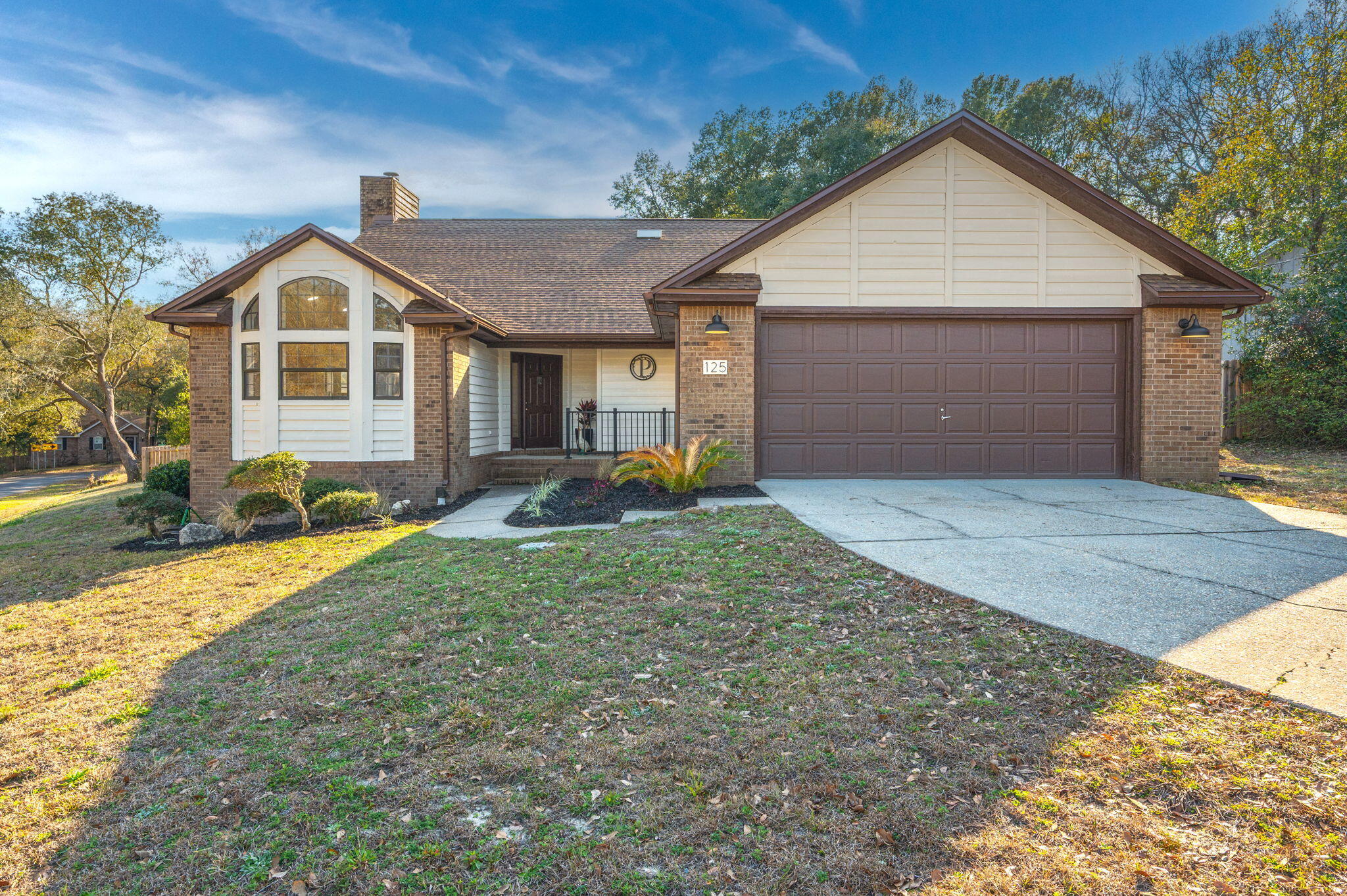 WELCOME HOME to this beautifully updated 3 bedroom + AN OFFICE property with curb appeal and modern upgrades throughout. This home is almost as far south as you can get in Crestview with easy access to Highway 85 making it a breezy commute. This property has also been fully REFRESHED and offers a BRAND NEW ROOF - giving you some peace of mind! Step inside to discover a bright and airy layout with stunning arched windows, a brick wood-burning fireplace, and a flowing floorplan that connects the kitchen, dining, and living space. Enjoy entertaining year-round with a brand new back deck with metal railing and an updated screened-in room - perfect for gatherings, relaxing evening, or weekend cookouts. The backyard also includes a new 10x12 craftsman-style shed, providing additional storage or workspace potential. With so many updates inside and outside this home.. it's hard to just name a few (so check out the upgrades document!). Don't miss your opportunity to check this charming property out!!