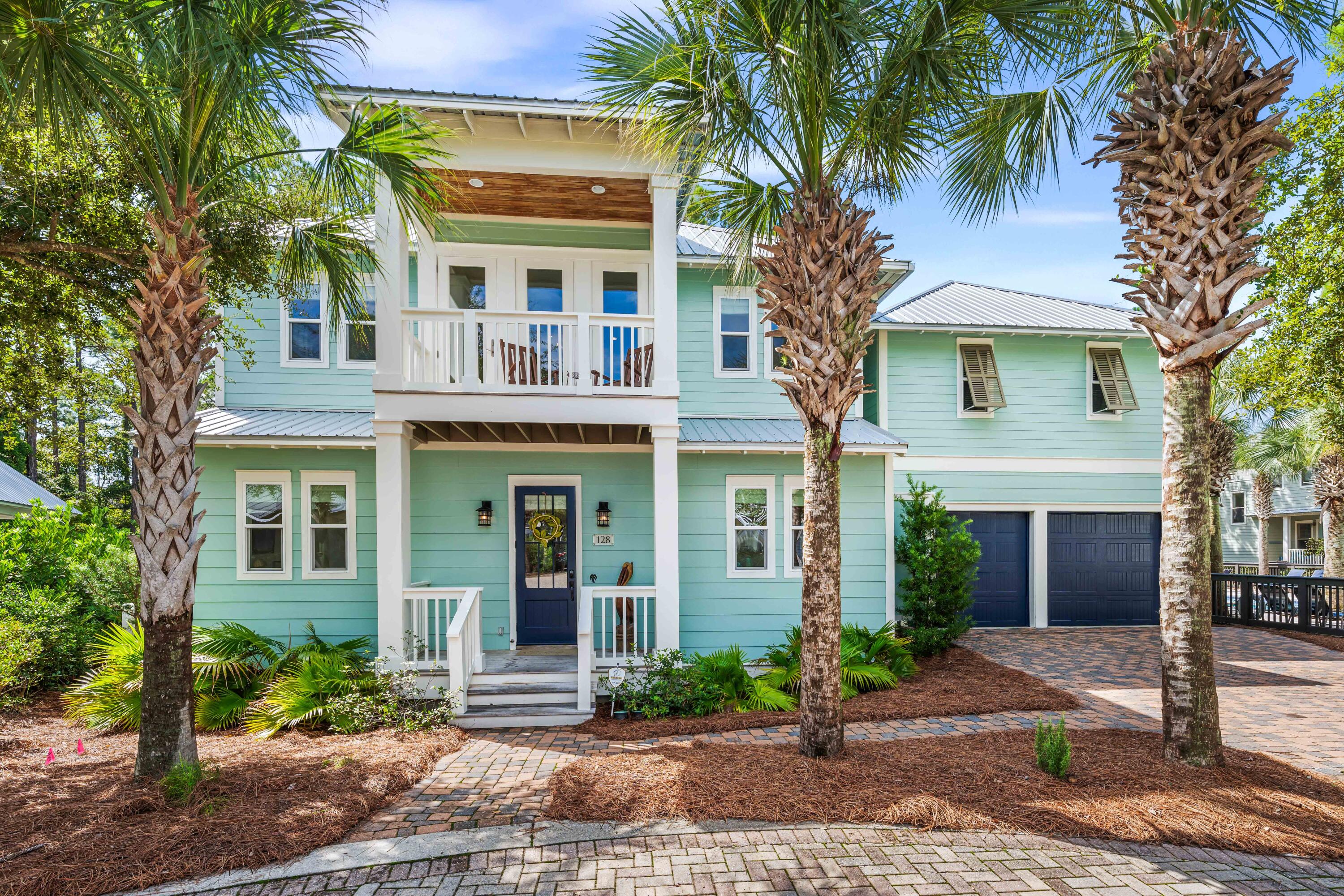 Welcome to 128 Eastern Lake Court, an extraordinary residence located in the heart of Seagrove Beach on the highly sought-after 30A corridor. Nestled on one of the largest lots in the neighborhood at .40 acres, this home offers a rare combination of luxury, privacy, and prime location. As one of the few homes in the community featuring a separate carriage house with guest quarters and a full kitchen, this property provides unmatched flexibility, making it perfect for hosting extended family, friends, or generating rental income. The 2-car garage further enhances the convenience and functionality of this remarkable home.

Upon arrival, you'll immediately appreciate the meticulously maintained grounds and proximity to the community's recently updated pool area. Just steps from your door, the pool offers effortless access to relaxation and recreation, making it feel like an extension of your private oasis. The spacious screened-in back porch, complete with built-in heaters, is the perfect place to unwind on cool evenings or enjoy al fresco dining year-round.

Step inside to discover elegant, coastal-inspired interiors where no detail has been overlooked. Beautiful wire-brushed oak flooring runs throughout the home, adding warmth and texture. The thoughtful floor plan includes a custom bunk room, making it ideal for family living or vacation rental purposes, with space for guests to enjoy comfort and privacy.

Beyond the home itself, its unbeatable location is just a short walk or bike ride from the county-owned and protected beach access with 300 feet of pristine beachfront. Whether you're in search of morning strolls along the shoreline or relaxing days spent under the sun, this home offers the best of beachside living.

You'll also find yourself moments away from some of 30A's best dining and shopping options. Nearby, the Old Florida Fish House offers a laid-back coastal dining experience, while Greenway Station is home to a variety of boutique shops and restaurants. Whether it's grabbing a morning coffee, enjoying a leisurely meal, or exploring the vibrant local community, everything you need is right at your fingertips.

128 Eastern Lake Court combines the perfect mix of luxurious features, an unbeatable location, and an enviable lifestyle. Whether you're looking for a primary residence, a vacation home, or a rental investment, this property checks all the boxes for a quintessential 30A living experience. Don't miss your opportunity to own a piece of paradise in one of Seagrove Beach's most coveted areas!