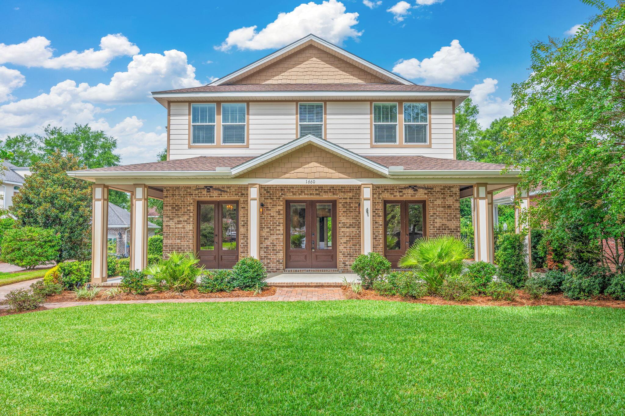 Nestled beneath mature oaks with meticulously landscaped front and back yards, this elegant New Orleans-style home sits just steps from the serene waters of Ward Cove and Choctawhatchee Bay. Located in The Parish at Bluewater Pointe—Niceville's most charming and intimate neighborhood—it offers a perfect blend of beauty, tranquility, and timeless character. With just 16 homes lining a brick-paved street, this family-friendly enclave offers exclusive water access via a private neighborhood dock, a central picnic area, and a welcoming, close-knit atmosphere.

A distinctly Southern wrap around porch with classic wood ceiling draws you in through glass paneled double doors to the wide, welcoming foyer. The high-quality finishes and refined color palette immediately impress with soaring 10-foot ceilings, rich acacia hardwood floors, detailed crown molding and millwork, 8-foot solid wood doors, and designer lighting throughout. For added convenience and comfort, automatic shades are thoughtfully installed throughout the home, allowing for easy privacy and light control at the touch of a button.

The main level offers two spacious flex rooms that can easily adapt to your lifestyleideal for a home office, formal dining, playroom, media room, or home gym. The inviting living room is centered around a gas fireplace and filled with natural light from three sets of French doors that open to a backyard oasis enclosed by ornamental metal fencing. Enjoy a covered dining area and an expansive patio constructed with stylish pavers, featuring a built-in wood-burning fire pitperfect for relaxing or entertaining guests!

At the heart of the home is a chef's dream kitchen, outfitted with high-end appliances including a Wolf gas range with pot filler, a custom vent hood, expansive granite countertops, a large prep island with sink, and elegant custom cabinetry. Whether you're entertaining guests or preparing a family dinner, this space blends style and functionality.

Upstairs, you'll find four spacious, carpeted bedrooms and three full bathrooms with beautifully detailed tile flooring. The spacious primary suite offers a luxurious retreat, featuring a jetted tub, dual vanities, and a tiled walk-in shower. Two of the secondary bedrooms are connected by a convenient Jack and Jill bathroom, while the fourth bedroom enjoys access to its own private full bath. A guest-friendly half bathroom is conveniently located on the main level, adjacent to a versatile laundry and mudroom combo. This thoughtfully designed space includes a utility sink with countertop space, custom cabinetry, and practical shelving and hooksperfect for storing shoes, coats, hats, and backpacks, making daily comings and goings a breeze.

Don't miss your chance to live in this rare blend of classic Southern charm and modern elegance. Schedule your private tour todaythis extraordinary rental won't last long!