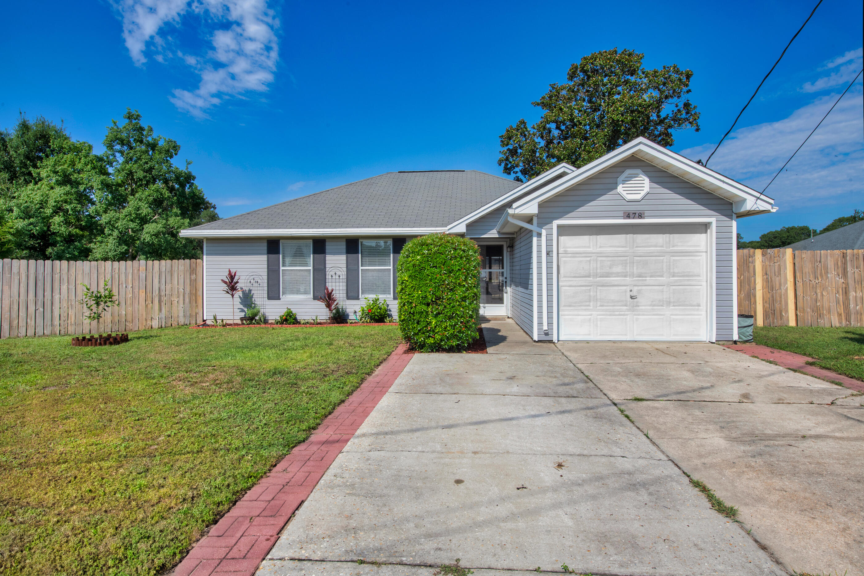 Tired of fixer-uppers and outdated layouts? This updated, move-in-ready home checks every box — just minutes from Hurlburt Field and within 30 minutes of Eglin AFB. Whether you're PCSing, investing, or simply ready to stop renting, this home is set up to simplify your life.
You'll love the cathedral ceiling in the living room, the seamless flow of the open floor plan, and the low-maintenance setup with no major updates needed. Step outside to two private backyard areas, including a turf-covered play zone for kids or pets. With Wi-Fi-enabled garage access, modern finishes, and a thoughtful layout, everything is in place — including a large attic that provides extra storage space for all your extras, hobbies, or gear. Even better? The sellers are willing to include the furniture, extra flooring, tools, paint, and yard equipment  a true turnkey opportunity.
Plan: Schedule a showing, fall in love, and secure your future here.
This one won't last  move fast before someone else does!