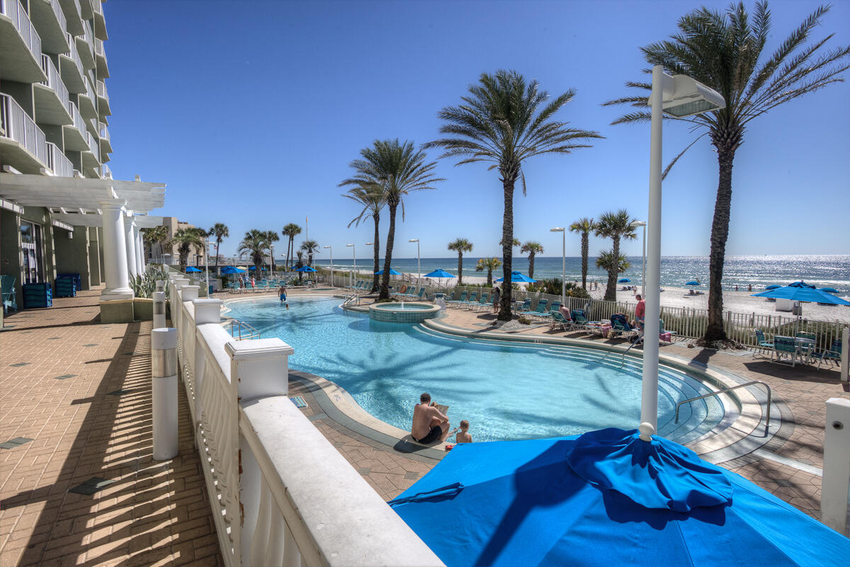 *Amazing view** This Gulf front condo in a great location on the east end of Panama City Beach. 2BR/2BA with a bonus room that is used as 3rd Bedroom. Positioned in a gated community, this property has rentals already on the books, making it an instant turnkey opportunity for investors. Fully furnished condo includes: LVP flooring throughout and a master suite with gulf front views, private bath with dual vanities, soaking tub, separate shower and walk-in closet. Enjoy access to Boardwalk's beachfront bar & grill, two gulf-front swimming pools, hot tubs, kid's splash zone, fitness center and arcade/game room. All dimensions are approximate.