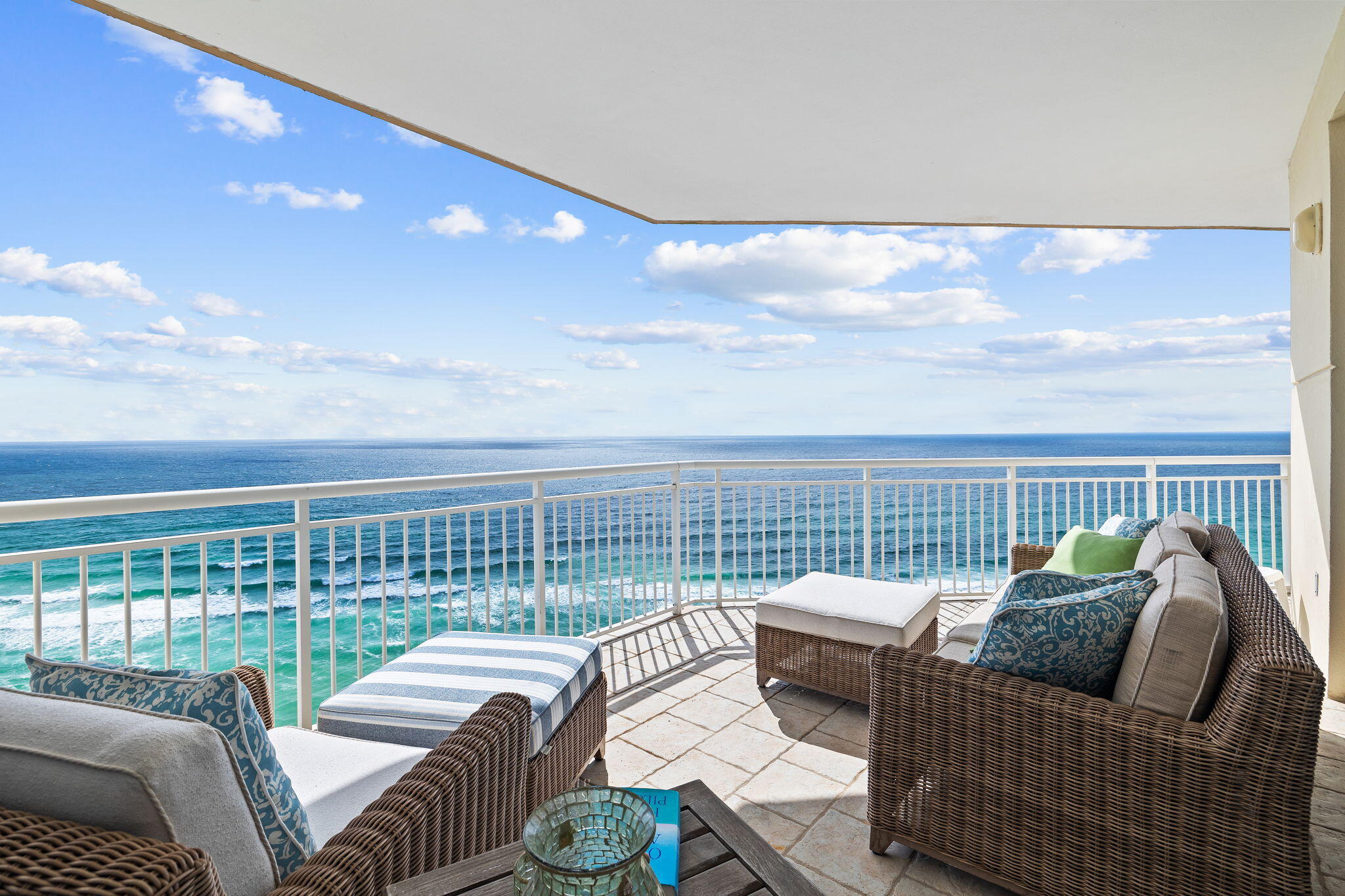 Welcome to Paradise Found. Luxurious unparalleled coastal beauty awaits you on Navarre Beach.  Rarely does a 5 bedroom, fully furnished Penthouse at Belle Mer become available.  Lovingly named 'Paradise Found', Penthouse1601, boasts a coveted private garage plus a covered parking space and ample storage.  This brilliantly designed one level five bedroom, five bath condominium home lives like a beach house. Unmatched Paradise Found majestically rises above the rest and features multiple balconies for outdoor living and dining. This well-appointed furnished grand residence features reclaimed heart pine flooring, maple solid core doors and deep trim, custom built ins, unique barrel feature in the living area, crown molding and recessed lighting. Stunning vistas and sound views capture miles and miles of gulf waters and intracoastal waterway.  The azure waters of the Gulf of Mexico, white sandy beaches and the sparkling Intracoastal Waterway of the Santa Rosa Sound unfold before your eyes creating an awe-inspiring sense of wonder. The open living spaces with delightful views are flooded in natural light making it the heart of the home while providing distinct, comfortable spaces for entertaining your family and friends "southern coastal style".  Five graciously sized ensuite bedrooms enjoy views and four bedrooms let on to a balcony.  There is a true sense of arrival from the moment you step off your elevator with restricted access to the penthouse level. The entry foyer and gallery hall at once announce you have arrived at the most beautiful gulf front condominium home on Navarre Beach.  The romantic Master Bedroom suite with views for miles is tucked away for the ultimate privacy. Retreat to your private Master Bedroom balcony and enjoy watching the sunset and star gaze at night. The butler's pantry with an additional full-size refrigerator and ample work and storage space is combined with the laundry and offers convenient access from the gallery hall to the kitchen.  The well-appointed kitchen with Viking appliances and ample quartzite countertop space is sure to please the resident chef.  The large wrap around balcony offers plenty of seating for entertaining and outdoor dining while enjoying gulf and sound views and island breezes.  Marvel at the sea life and delight at seeing the wind catch the sails of watercraft leisurely sailing on the sound. We invite you to discover Belle Mer with only 62 gulf front residences, over 200 feet of beach, a gulf front hot tub and pool, tennis and basketball, meeting room with kitchen and a gym.  For the adventurous, enjoy excursions as Navarre Beach is nestled perfectly between Destin and Pensacola for brief pleasure trips to discover some of the finest in casual and fine dining, shopping, and entertainment on the Emerald Coast. The Navarre Beach Pier, the longest pier on the Gulf coast, is nearby where you can enjoy fishing, boat watching, or gazing at the views of the Gulf Islands National Seashore. Eight miles of undeveloped pristine shoreline beckon you to explore the beach. Make your appointment today to preview Navarre Beach's premier gulf front condominium with million-dollar panoramic views. We invite you to make an appointment today and discover your "Paradise Found"  Penthouse 1601 at Belle Mer on beautiful Navarre Beach.