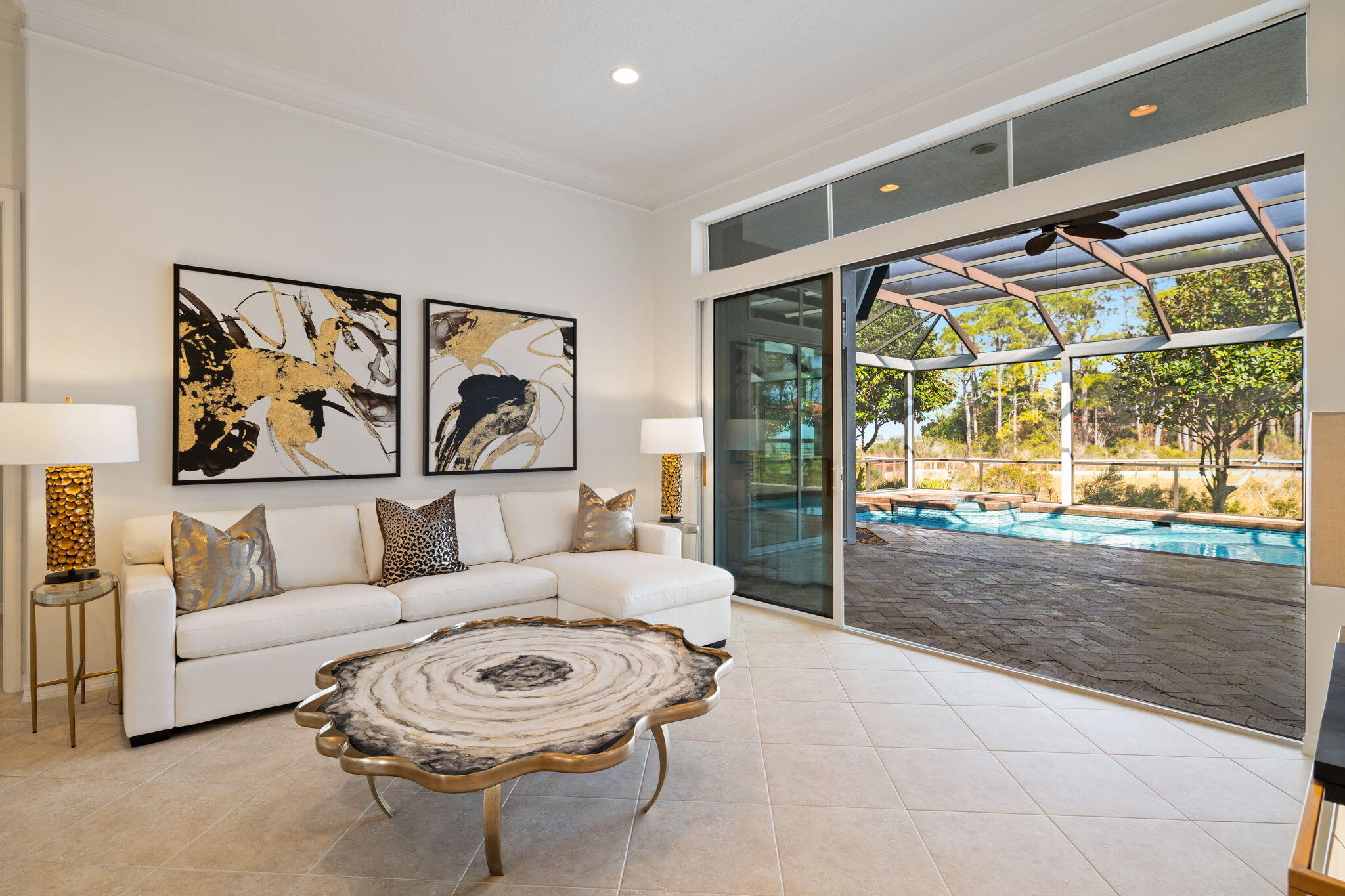 Under contract with 72-hour Kick-Out Clause. Accepting backup offers. Move-in ready, beautifully refreshed interior painting with professional design touches. This house is a must-see! Located at the end of a serene cul-de-sac on one of Kelly Plantation's most sought-after streets, this custom four-bedroom, three full and two half-bath home exemplifies luxury living.  The thoughtful floor plan seamlessly blends spaces for both sophisticated entertaining and relaxed, everyday living.

Upon entering, you are welcomed by a foyer opening to the dining room on the right and the formal living room directly ahead. The sliders lead to the screened lanai with the pool, spa, summer kitchen, and views of the Bay. A private office, complete with custom built-in bookshelves, and a powder room are conveniently located off the foyer to the left. A primary suite option on this side of the home offers privacy with its ensuite bathroom, walk-in closets, and sliders to the lanai. The gourmet kitchen boasts stunning Bay views, abundant cabinetry, gleaming granite countertops, a center island, and stainless-steel appliances, including a gas range. The kitchen flows effortlessly into the breakfast area and spacious family room, creating an ideal space for family gatherings and entertaining. There is also direct access to the lanai, making alfresco dining a breeze. 

A second primary suite is designed with luxury in mind, featuring access to the lanai, dual walk-in closets, and a spa-inspired bath with a large walk-in shower, jetted tub, double vanity, and private water closet. Two additional bedrooms share a well-appointed full bath, creating a split-bedroom floor plan. 

Kelly Plantation offers many community amenities and ideal location close to shopping, dining, schools, and area beaches. 

Buyer to verify all information deemed important.