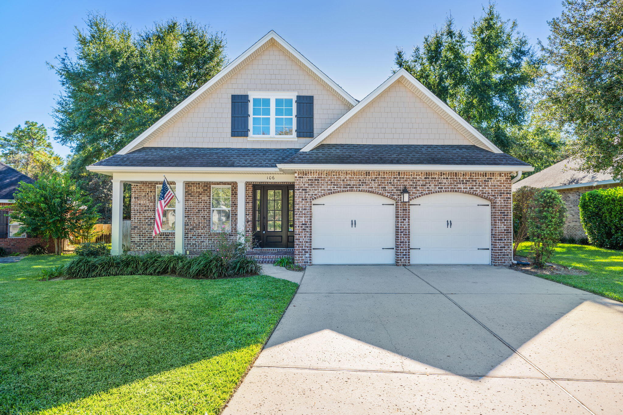 Located in the highly coveted Swift Creek Preserve, this beautifully maintained 5-bedroom, 3.5-bath home offers over 2,600 sq. ft. of modern Florida living. Enjoy hardwood flooring throughout the main level, a dedicated office/5th bedroom, half bath, and an open-concept living room and kitchen. The kitchen features stone countertops, stainless steel appliances, upgraded lighting, tall ceilings, pantry, gas range, and a large island with seating for 4-5. The first-floor primary suite includes a dual-sink vanity, soaking tub, tiled walk-in shower with glass enclosure, and a spacious walk-in closet. Upstairs offers a secondary living area, three additional bedrooms—one with an en-suite—and a full bath with shower-tub combo. Fresh paint throughout enhances the bright, airy feel. Additional highlights include a laundry room with washer, dryer, utility sink, and storage, plus a two-car garage with built-in cabinets and overhead storage. Enjoy outdoor living on the fully screened back patio with TV and ceiling fan, a step-down patio for grilling, and a fully fenced yard with storage shed. A rare opportunity to rent a traditional, upgraded home in one of Niceville's most desirable communities!