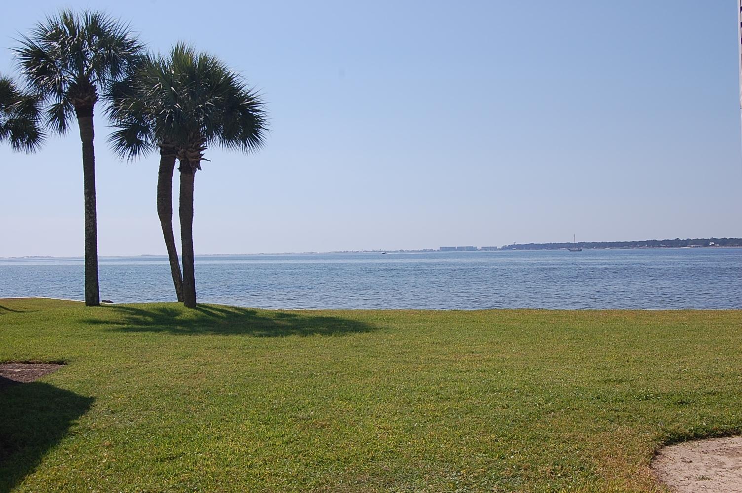 Enjoy the peaceful waterview from your 2nd floor balcony in this conveniently located quite bayfront complex that is right across from the Shalimar Yacht Basin. This unit has newer water heater, toilet, dishwasher, stove, kitchen cabinets/countertops. Complex has pool, sauna, tennis court, fishing dock and laundry room. Water, Sewer, Trash included in rent. Available August 10.