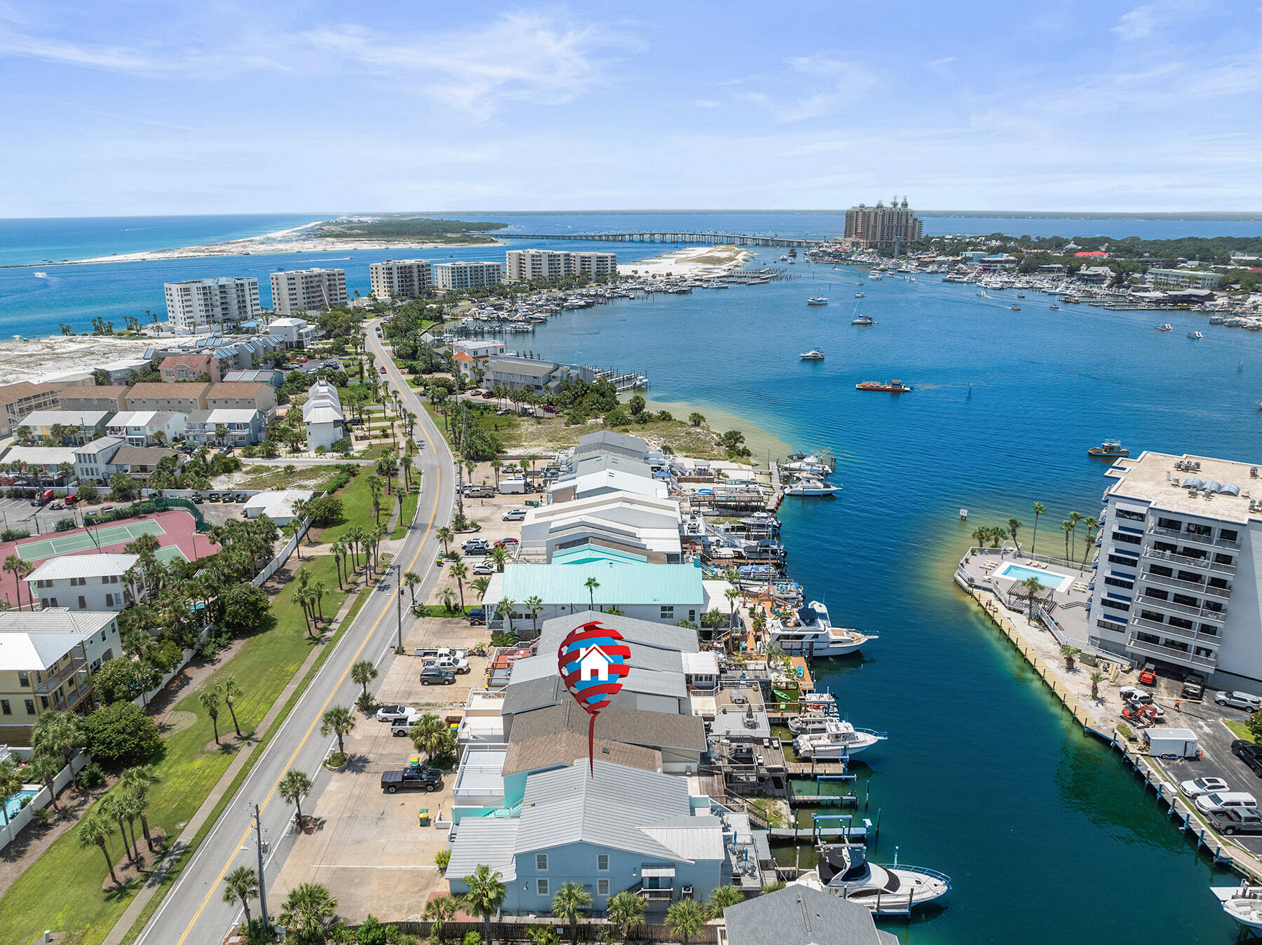 Beautifully Renovated Townhome, Every Detail Carefully Curated! Listed Under Recent Appraised Value! 50' Boat Slip & 16k lb. lift!  Must See This Fully Furnished, Updated, Turnkey Waterfront Townhome with Amazing Views of the Destin Harbor! Rental Ready & Easy Convenience to 3 Beach Accesses! This 4 Bedroom 3 bath is located on the Exclusive Destin Harbor, Ready to Start Making you Money & Memories Immediately! This Multi-Level Townhome is Perfect for Living your Beach Life Dream on the Water! Use as a Second Home, Full Time Residence, Vacation Home, or a phenomenal addition to your investment portfolio with short- or long-term rentals! Dock your boat right in your backyard in your own private 50' boat slip. You are less than 10 min. to Destin's East Pass, the Gulf and Crab Island! This