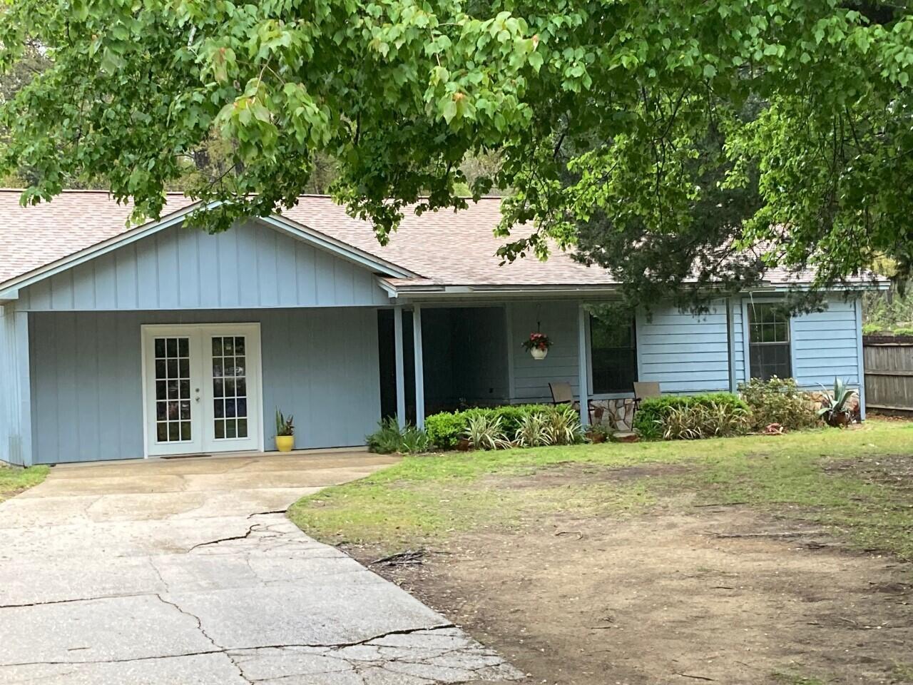 This updated home has engineered wood and ceramic tile floors.  Updated kitchen grey bottom cabinets and white top cabinets, black appliances.  Also there is a 19 x 12 Utility room for storage and the laundry hookups. Home has just been repainted.  This is a nice fresh look for any rental.  Please no smoking or pets allowed.  Credit check is required.  First months rent plus a security deposit.