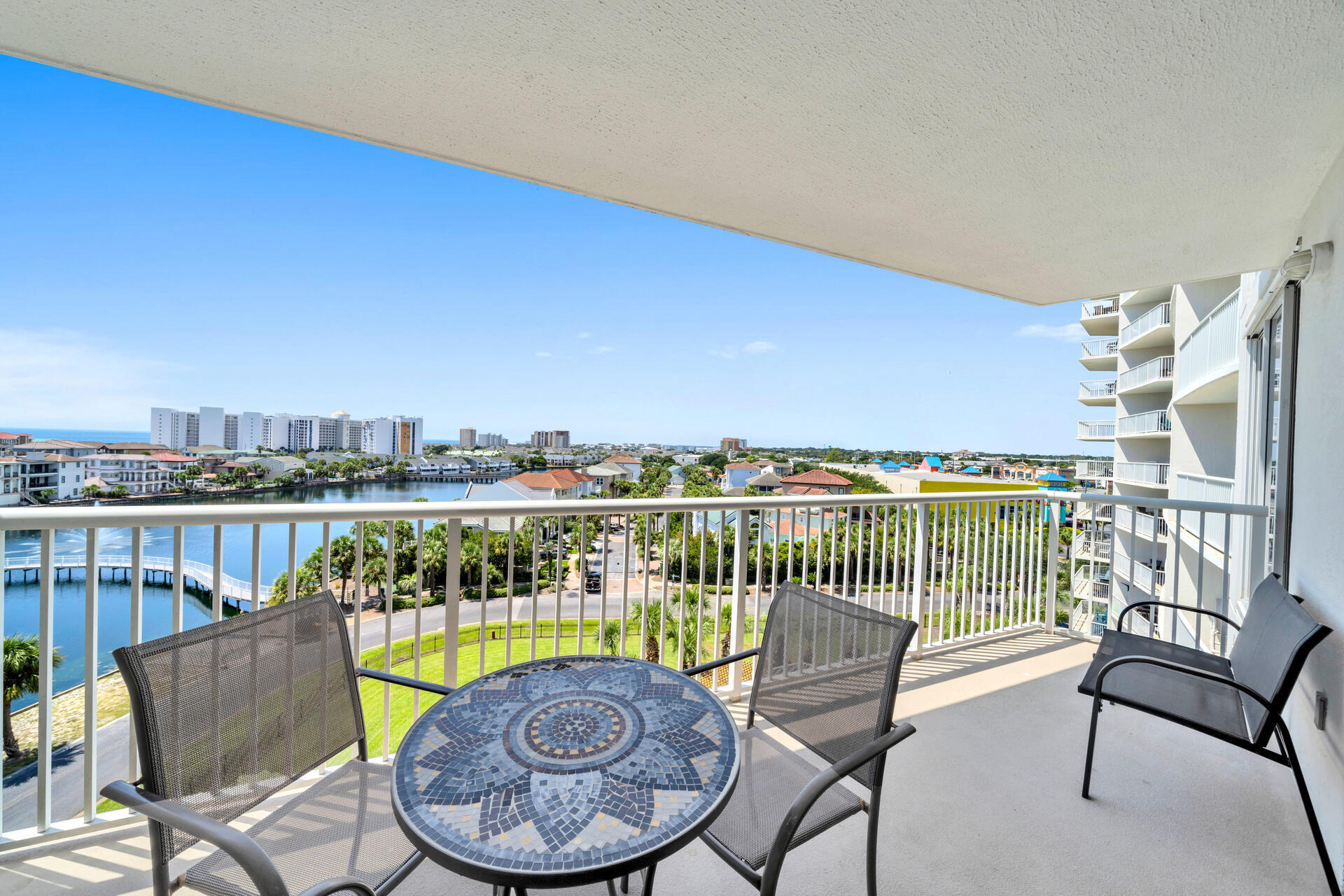 The Terrace at Pelican Beach Resort located right in the heart of Destin, across from Destin's most popular waterpark. This unit, perfectly located in building overlooking beautiful views along the Emerald Coast beachside. Spectacular view of Gulf of Mexico, lake and pool. The Terrace has its own pool, hot tub and workout, deeded access to beach, 3 pools on Pelican Resort property, one heated for cool months, Sauna/steam room, bbq grills, fittness rooms, tennis, and community room. Master bedroom overlooks lake and Gulf of Mexico with floor to ceiling windows. Must see unit