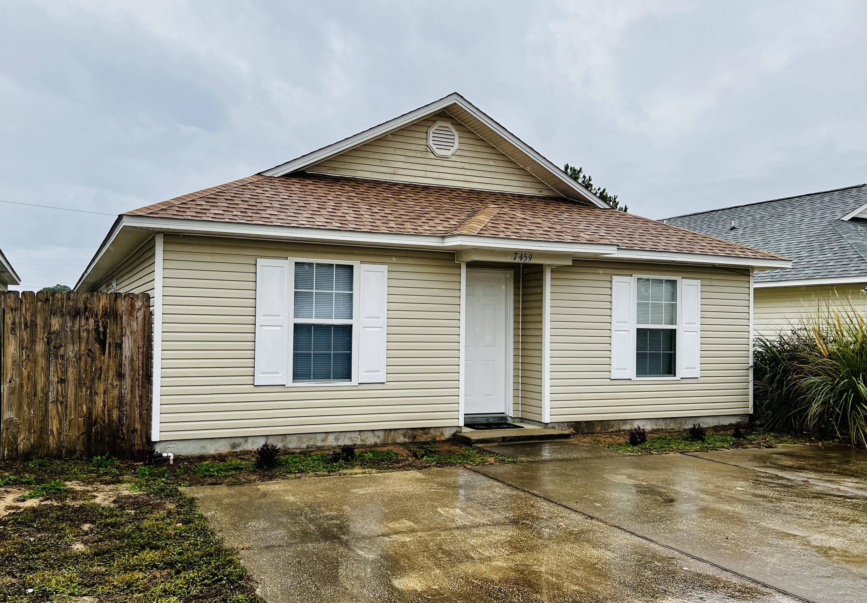 Newly updated 2 bedrooms and 2 full bathrooms duplex Just a short drive to  shopping and schools in Navarre.  spacious living area with vaulted ceiling, new LVP through out and  separate laundry room