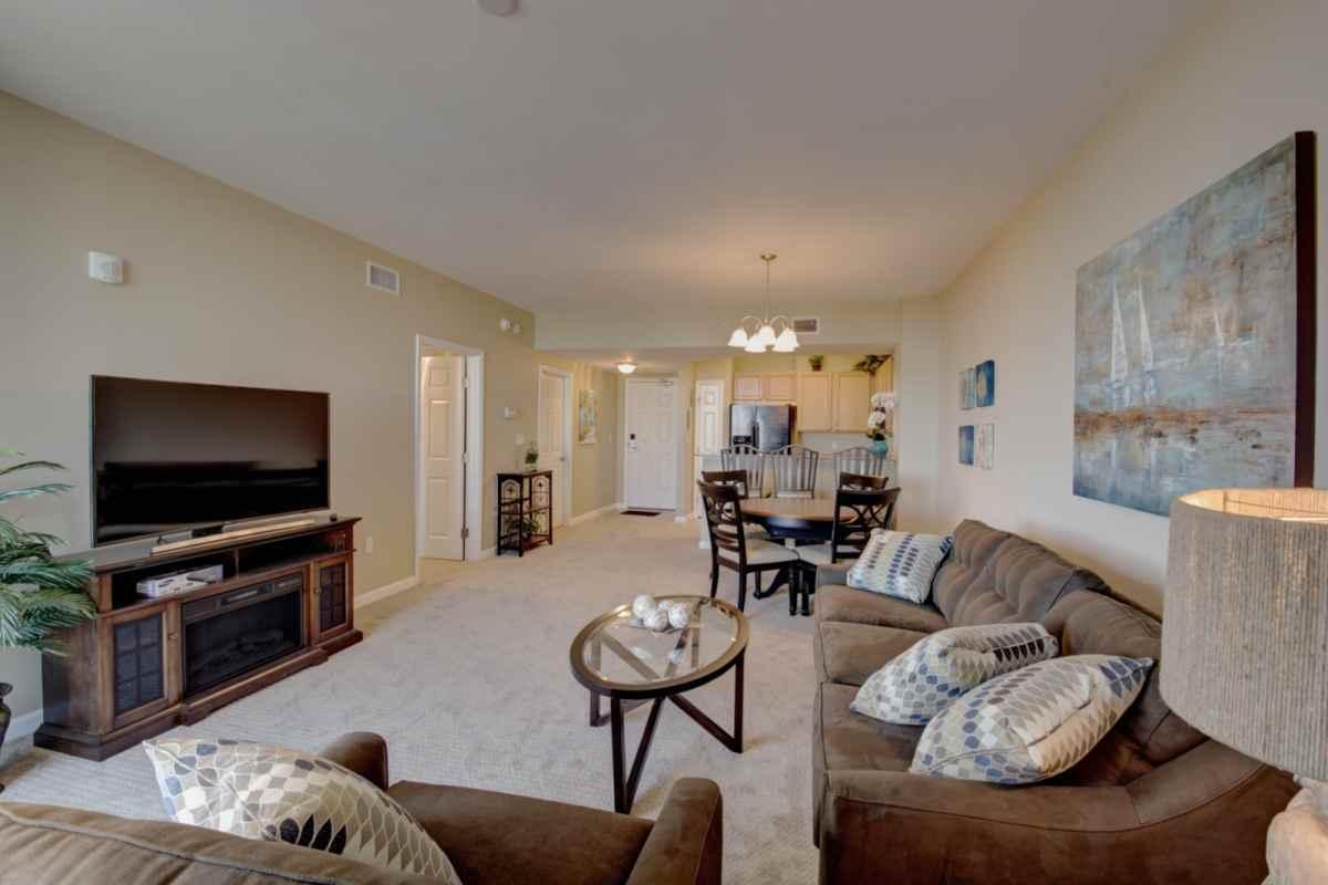 Luxury condo in the heart of Destin. Spectacular fully furnished 4th floor unit located in the East Tower. Custom bunk bed with a full sized bottom and twin top.Furniture, appliance and carpet less then 3 years old. Amenities include full spa, lagoon pool with waterfalls, hot tub, heated pool, children's pool with splash fountains, playground, tennis, basketball courts, fitness center, & conference center Shuttle service offered to public beach, Harborwalk and Destin Commons. HOA dues include all utilities and owners are allowed to have pets. Great to live in or use as a vacation rental. Don't miss your chance to own a 2 bedroom unit in Destin at an awesome price!