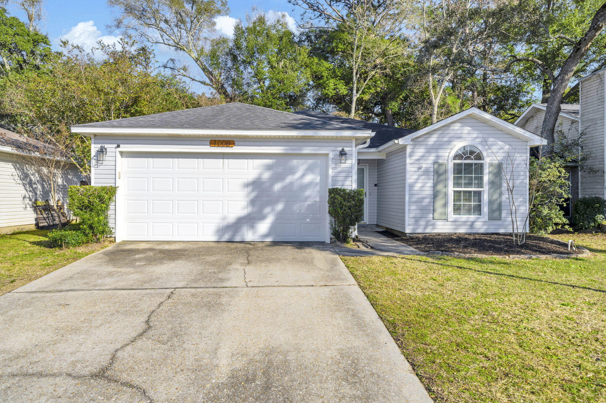 You won't want to miss this beautifully updated 3-bedroom, 2-bath home in the heart of Fort Walton Beach! Featuring a roof and HVAC both replaced in 2017, this home offers peace of mind along with modern updates throughout. Located in a quiet, centrally located neighborhood, the property is less than 4 miles to Hurlburt Field, approximately 8 miles to Eglin AFB, and just 7 miles to the beach.
 The open floor plan includes a spacious living area with wood flooring and high ceilings, creating a bright and inviting atmosphere. The kitchen has been updated with painted cabinets, updated hardware, epoxy countertops, stainless steel appliances, an updated faucet with cup rinser, and a tile backsplash. Enjoy outdoor living in the private screened-in patio, perfect for entertaining, along with a fire pit area in the backyard. Additional features include a 2-car garage with a 240V outlet, ideal for electric vehicles or power tools. Fresh interior paint, laminate flooring, and fresh exterior mulch complete this move-in-ready home. Convenient location, thoughtful upgrades, and major systems already replaced make this one must-see.