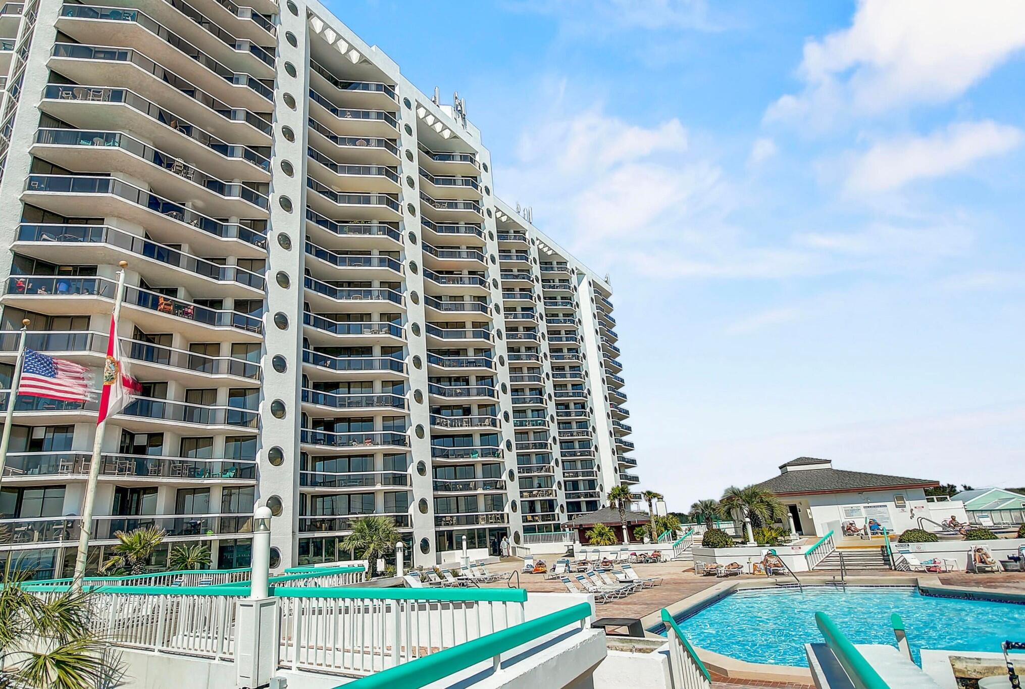 Motivated Sellers!  Impeccably remodeled and professionally furnished by Sugar Beach Interiors, this ground floor unit features a rare large private patio that opens to the rear of the building and is just 100 yards from the beach. Recent upgrades abound, including: Removal of Popcorn Ceilings, Fresh Paint Throughout, Enhanced Cabinet Hardware and Trim work, New Interior Doors, Stylish (LVP) flooring, Updated Sinks and Countertops in the kitchen and bathrooms, Modern Shower with Frameless Tempered Glass Door, Upgraded Shower Drain and Plumbing, New Water Valves, Contemporary Vertical Blinds and Custom Shelving, New HVAC unit with Smart Thermostat. Rental projection estimates are 40K - 50K.  Amenities:  SPA, Pool, Fitness Center, Laundry, BBQ Area, Restaurant, Tennis and Private Beach.