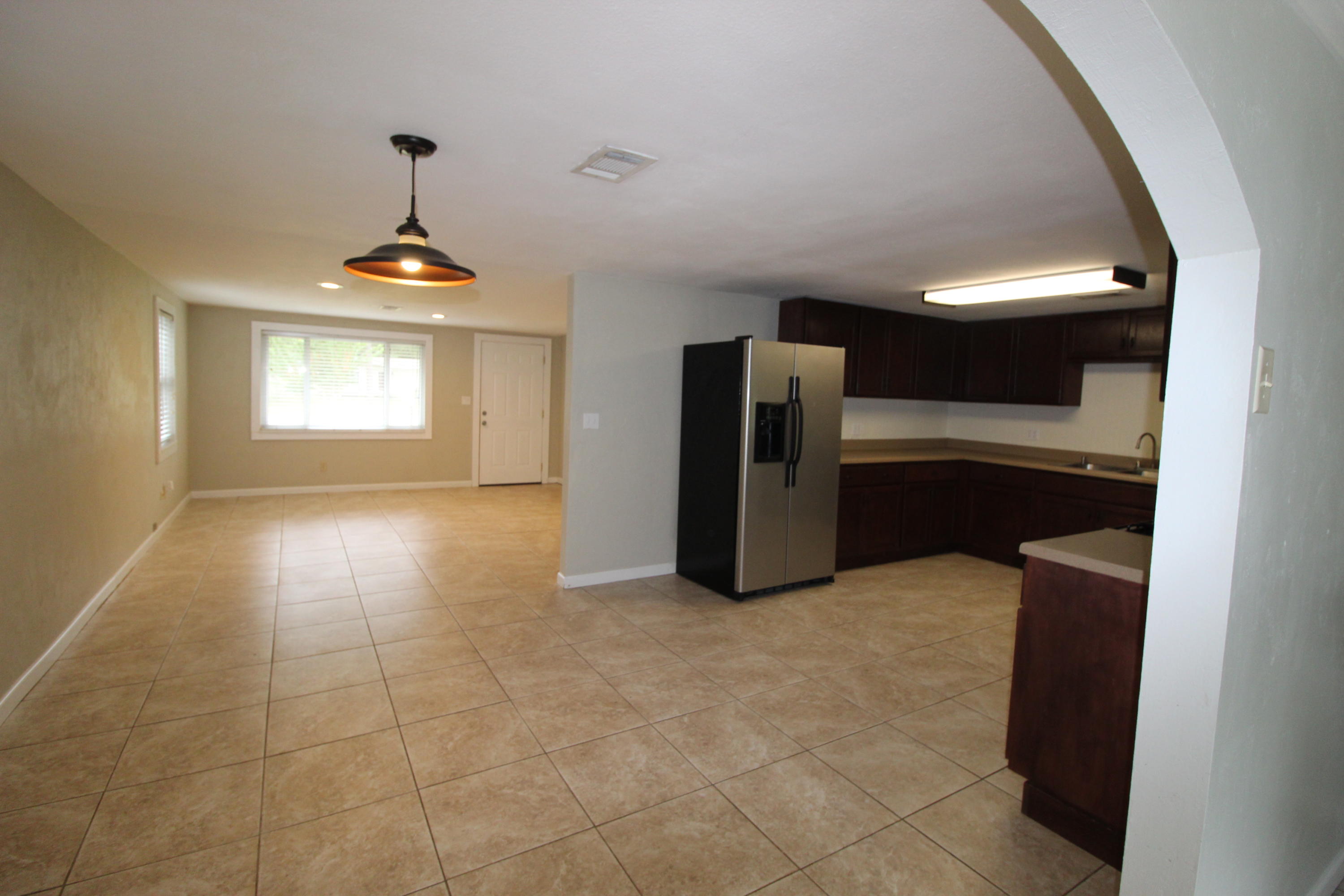A RARE FIND on the outskirts of Bluewater Bay in Okaloosa County Florida. The ''WOW'' is a one-half acre home site featuring a lovely 4-bedroom home and detached 2-car garage. Located just a few blocks from the Mid Bay Bridge by-pass. This home is built above grade, well maintained and move in ready. As you drive onto the extended and wide drive way you will admire the size of this home site. There are endless possibilities to expand and still obtain the privacy you desire. Large open porch to relax on the quite summer nights. Step inside and relax in the large family room. To the left is one hall to all the bedrooms; two rooms feature brand new carpet. Master Bedroom is set in the rear of home with view of the back yard. There is plenty of room in the Kitchen to add a center island the refrigerator will stay. The dining room is open to the Kitchen and bonus room that boast French Doors leading out to the large deck which as a gas bib for a grill or out door kitchen. The laundry room is just off the opposite side of the kitchen. Nestled in the far back corner of the fenced lot is a two-car garage or you may want to make use of it as a workshop. There are mature trees to provide nice shade from the bright Florida Sun. Metal Roof and double pain windows will add some savings on utilities.