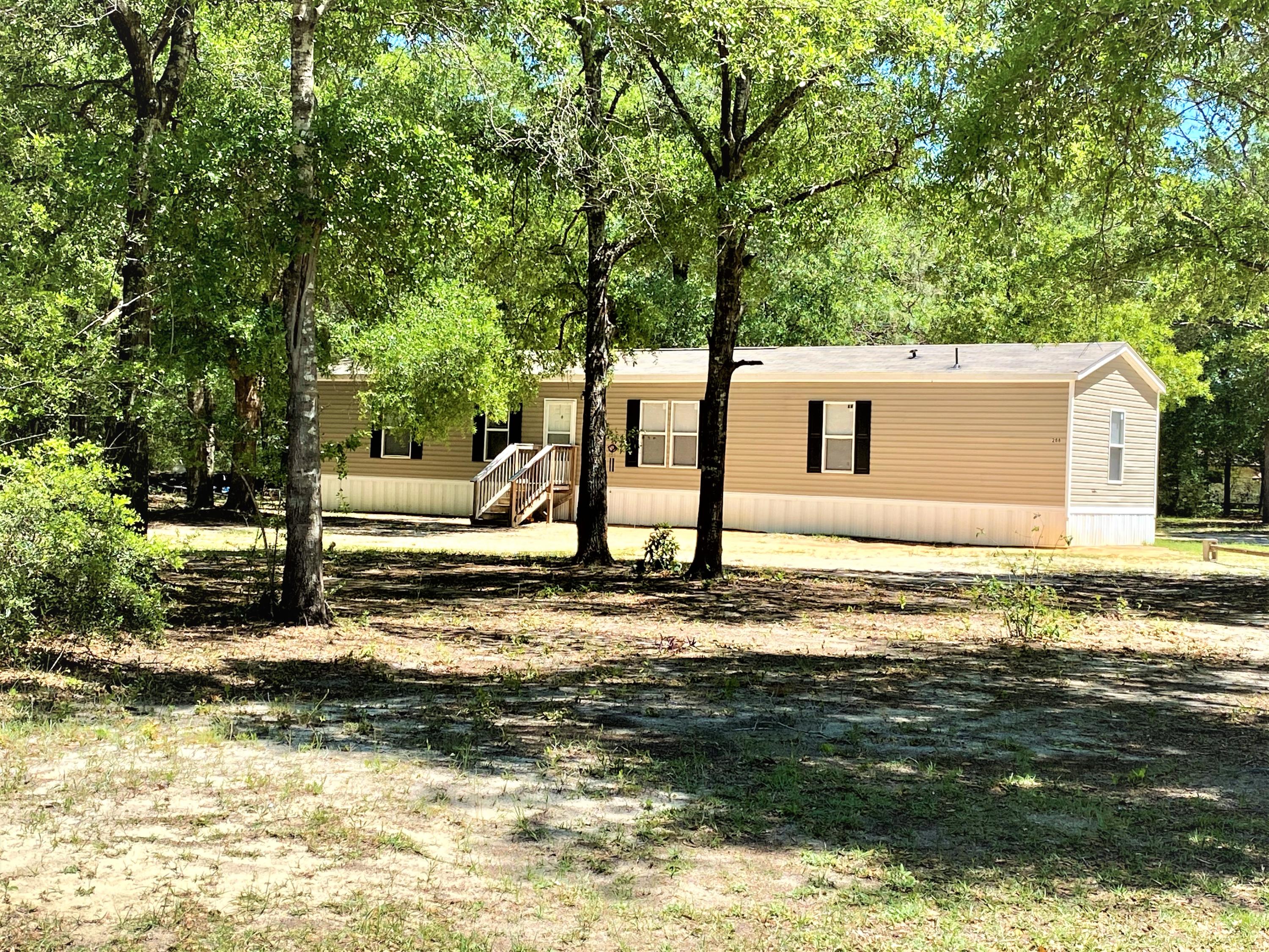 One of the Best Buys around with this 1080 sq. ft. of living area with central air/heat, near to town, with this 1.38 acres with a 2016 single wide mobile home. 3 bedrooms an 2 baths, inside laundry. Has city water and septic. Well kept and in great condition...So affordable and is eligible for FHA, VA or Conventional financing. A lot for the money!