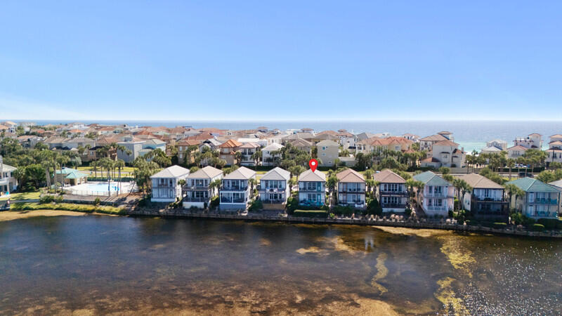 Destiny Beach Villas rock!!  Two fully furnished 2 bedroom/2 full bath rental units on Scenic Hwy 98 - just steps away from popular Crystal Beach.  Each unit is fully furnished and sleeps 8 people. Recent improvements include back deck furniture 2024, new king size mattresses 2024, new floors and kitchen cabinets in down unit 2024. Back yard is Four Prong Lake with lots of nature - fish, ducks and turtles.  Extended paver deck on down unit for barbecue.
Everything is near by - shopping and recreation.  Large community pool for owners and rental guests.  A totally relaxing property on a lake. Walking access over and under Scenic Hwy 98 to Destin's white sand beaches!!!   A top investment opportunity on the Emerald Coast.